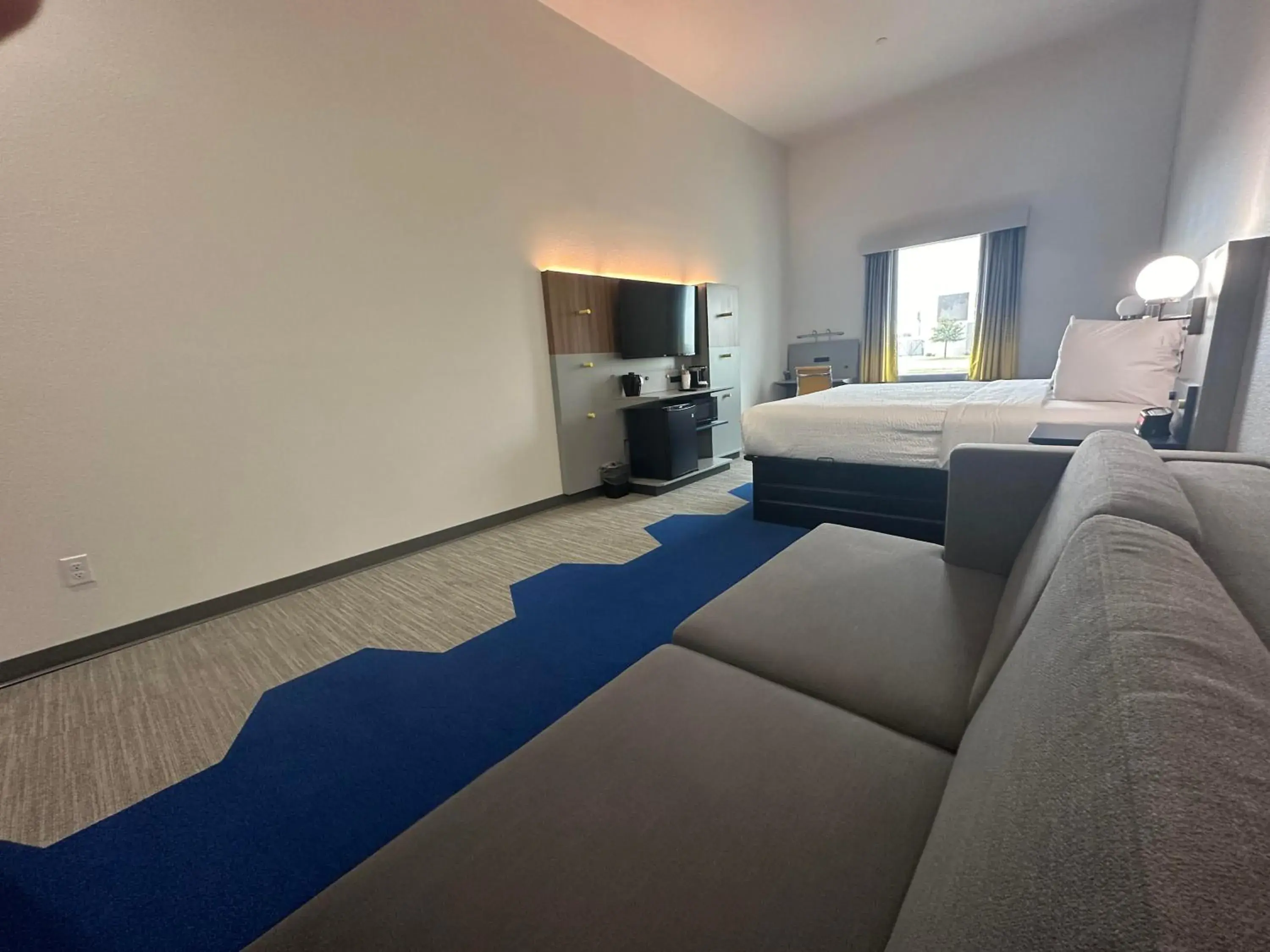 Seating area, Bed in Microtel Inn & Suites by Wyndham Amarillo West Seating area, Bed in Microtel Inn & Suites by Wyndham Amarillo West