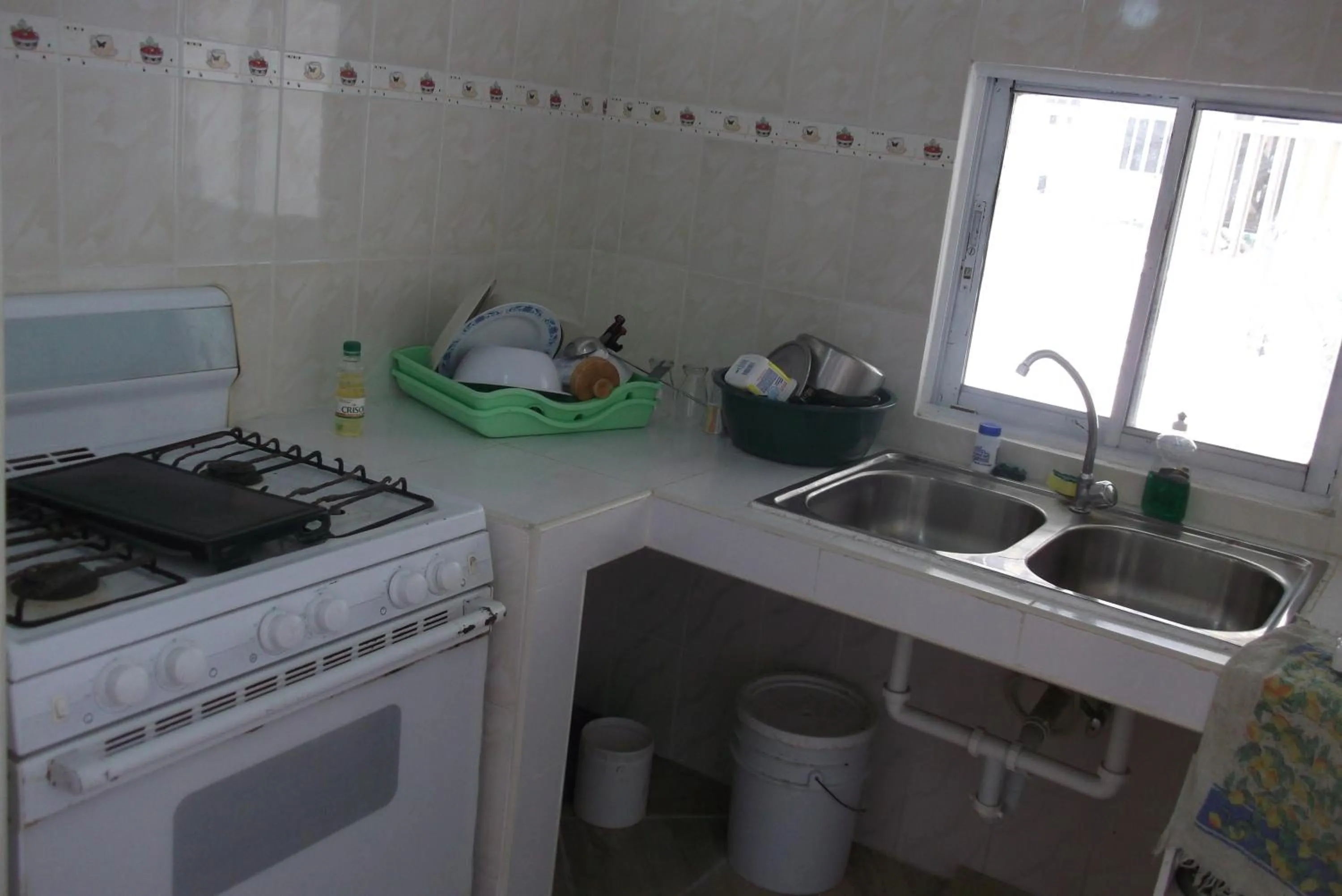 Communal kitchen in Lucy Rooms