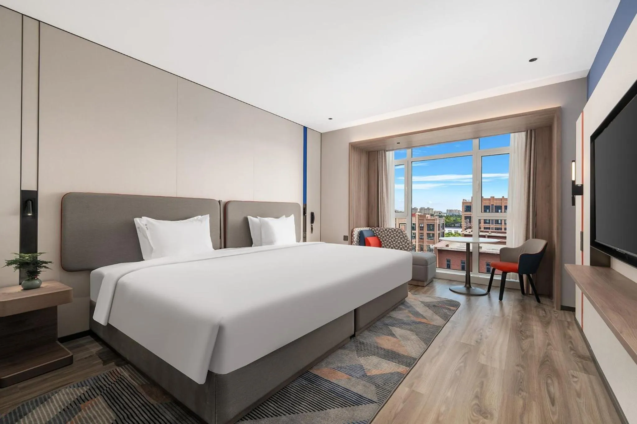 Photo of the whole room, Bed in Holiday Inn Express Qingdao Hongdao Station by IHG - Qingdao International Airport