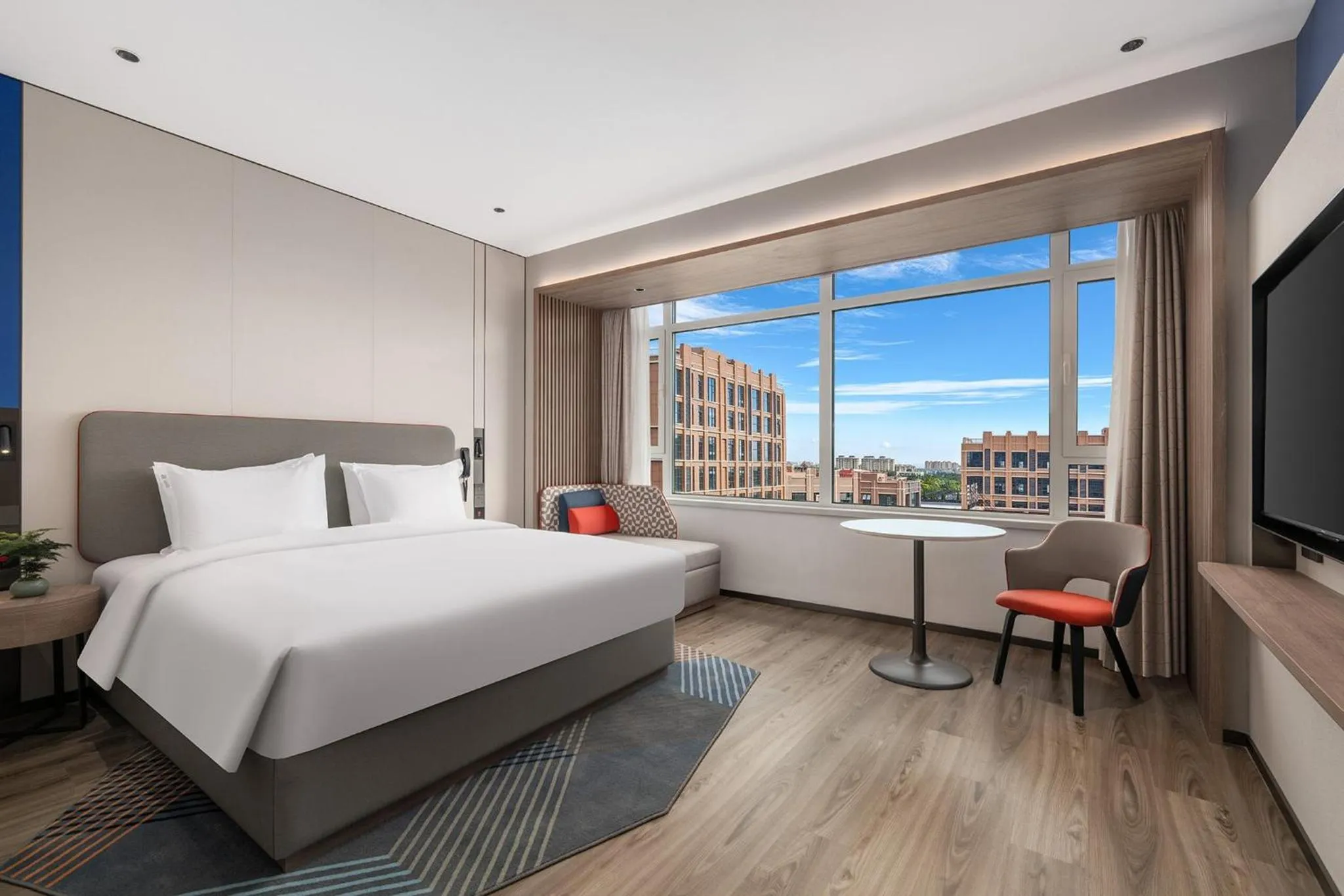 Photo of the whole room, Bed in Holiday Inn Express Qingdao Hongdao Station by IHG - Qingdao International Airport