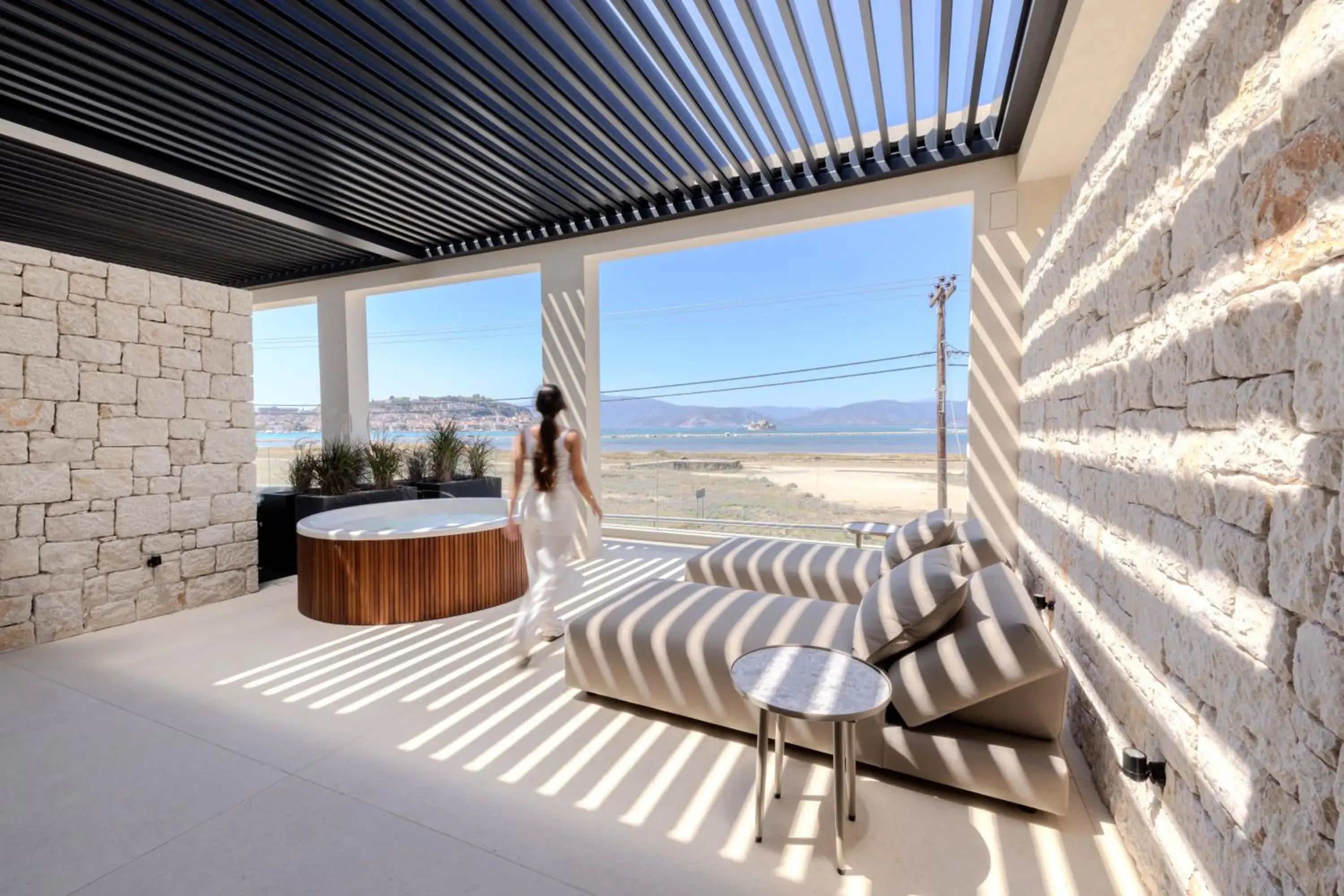 Deluxe Apartment with Sea view and outdoor Hydromassage Bathtub in Ilva Suites Deluxe Apartment with Sea view and outdoor Hydromassage Bathtub in Ilva Suites