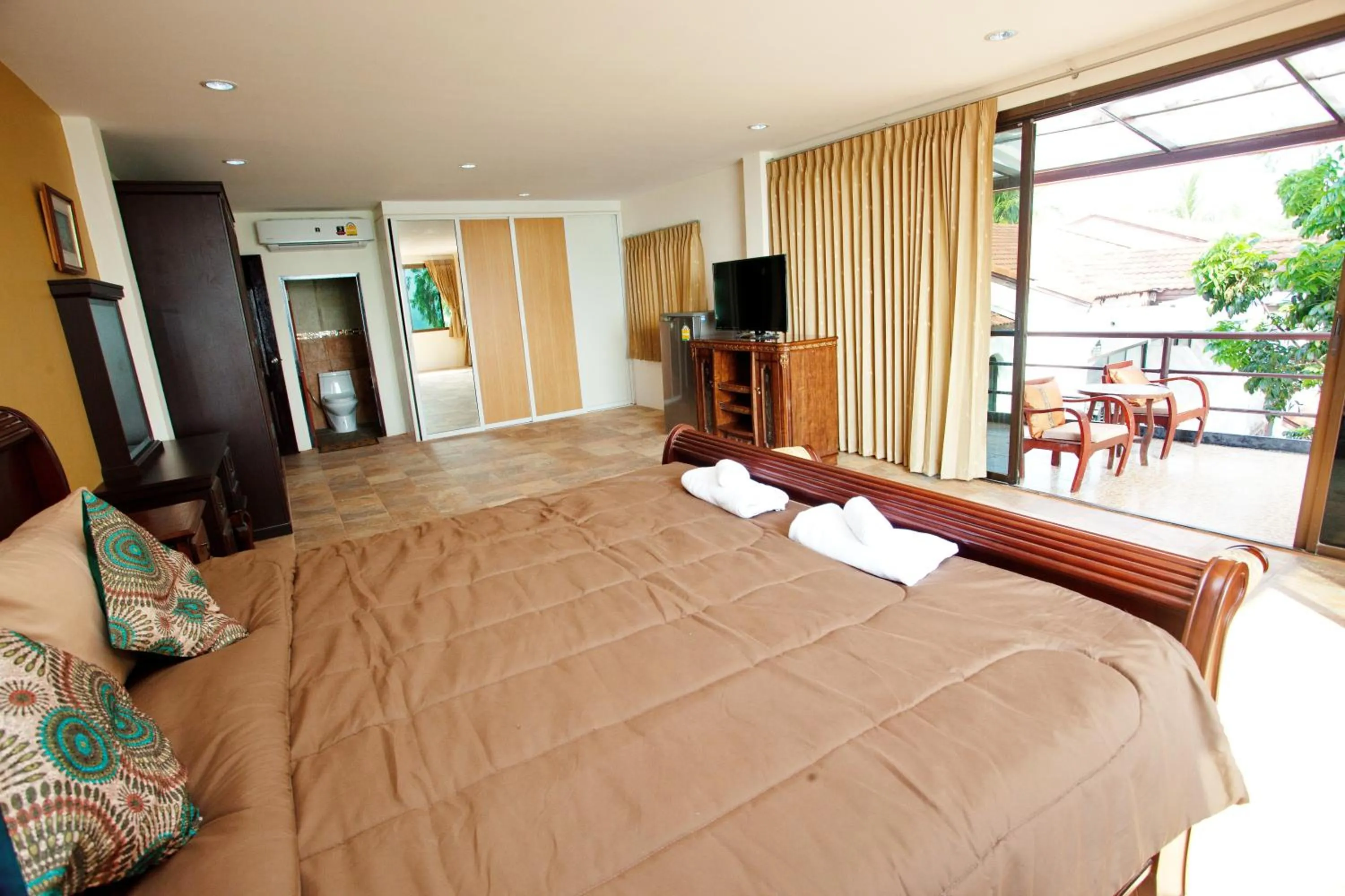 Bed in Sea Breeze Guest House