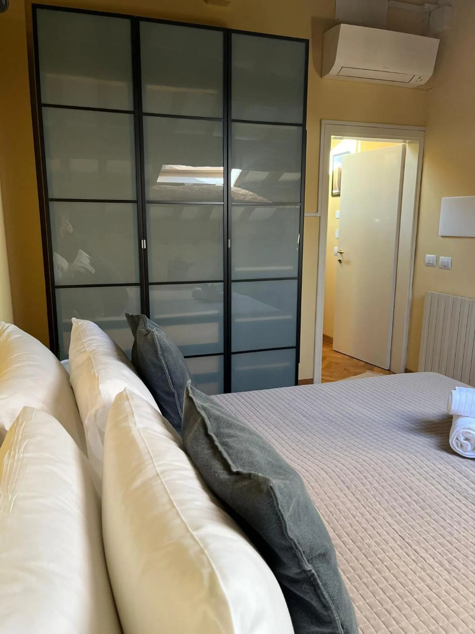 Bed in Apartment Hotel Marchesini