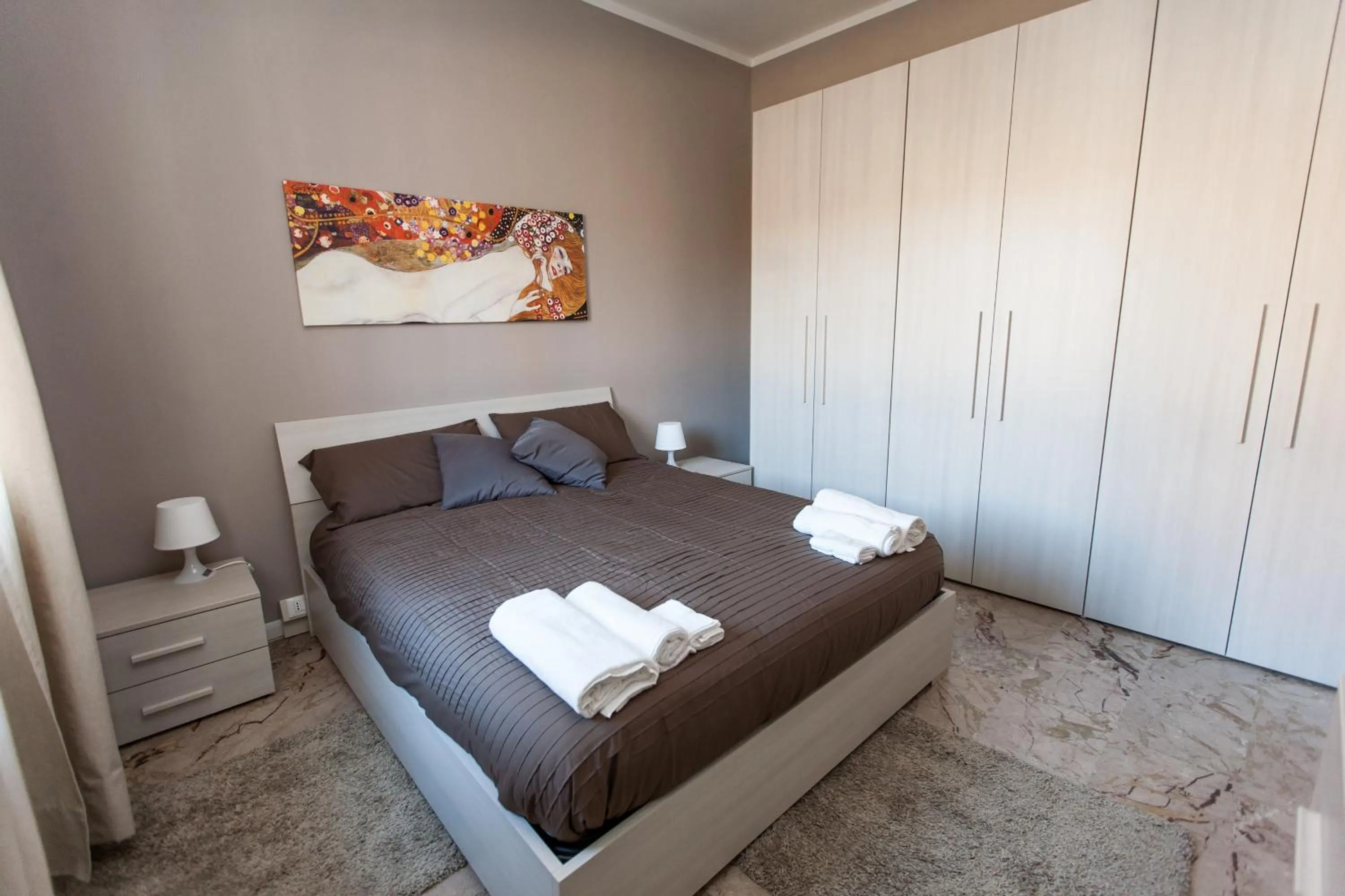 Bed in Apartment Hotel Marchesini