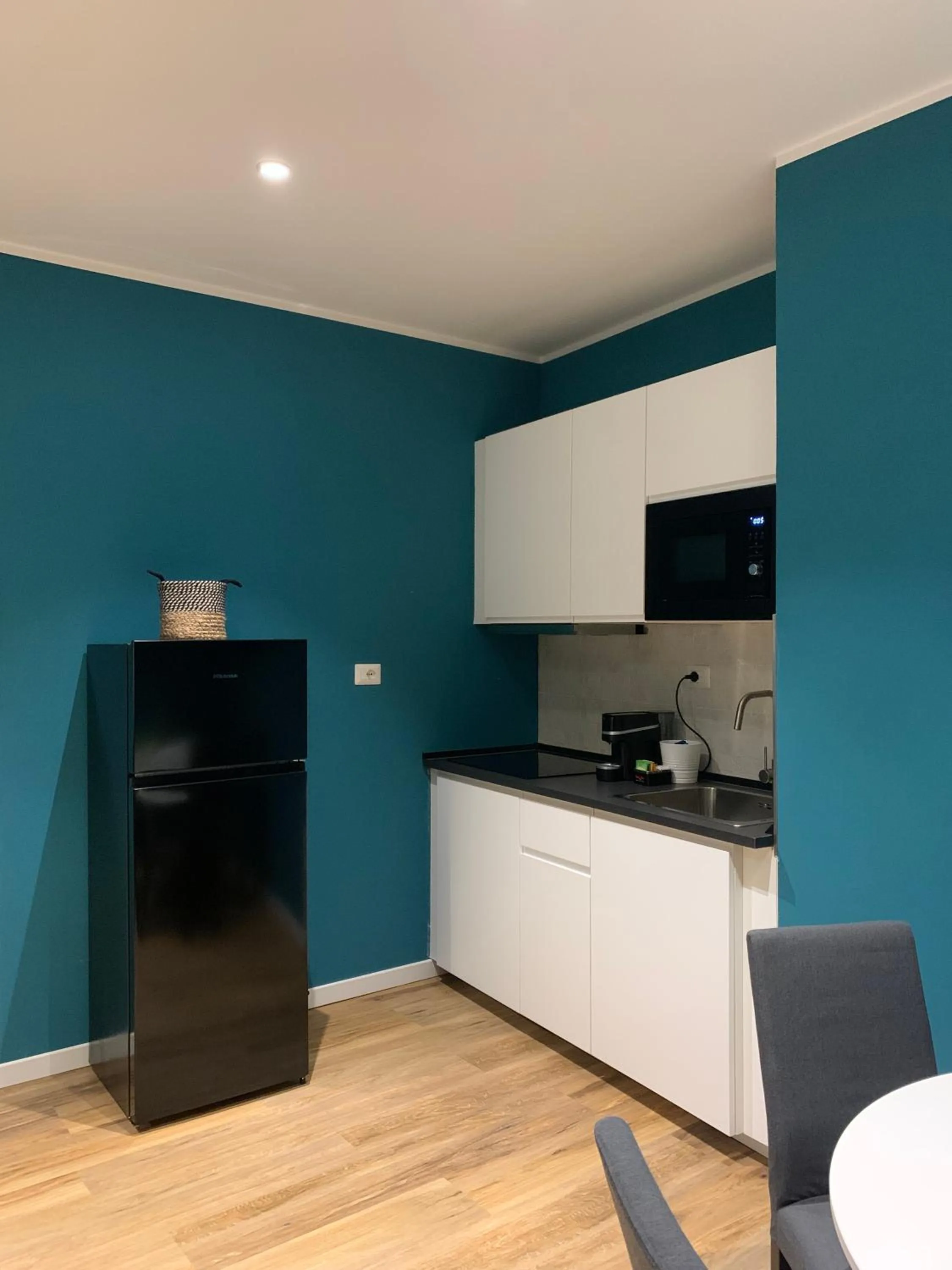 Kitchen or kitchenette in Apartment Hotel Marchesini