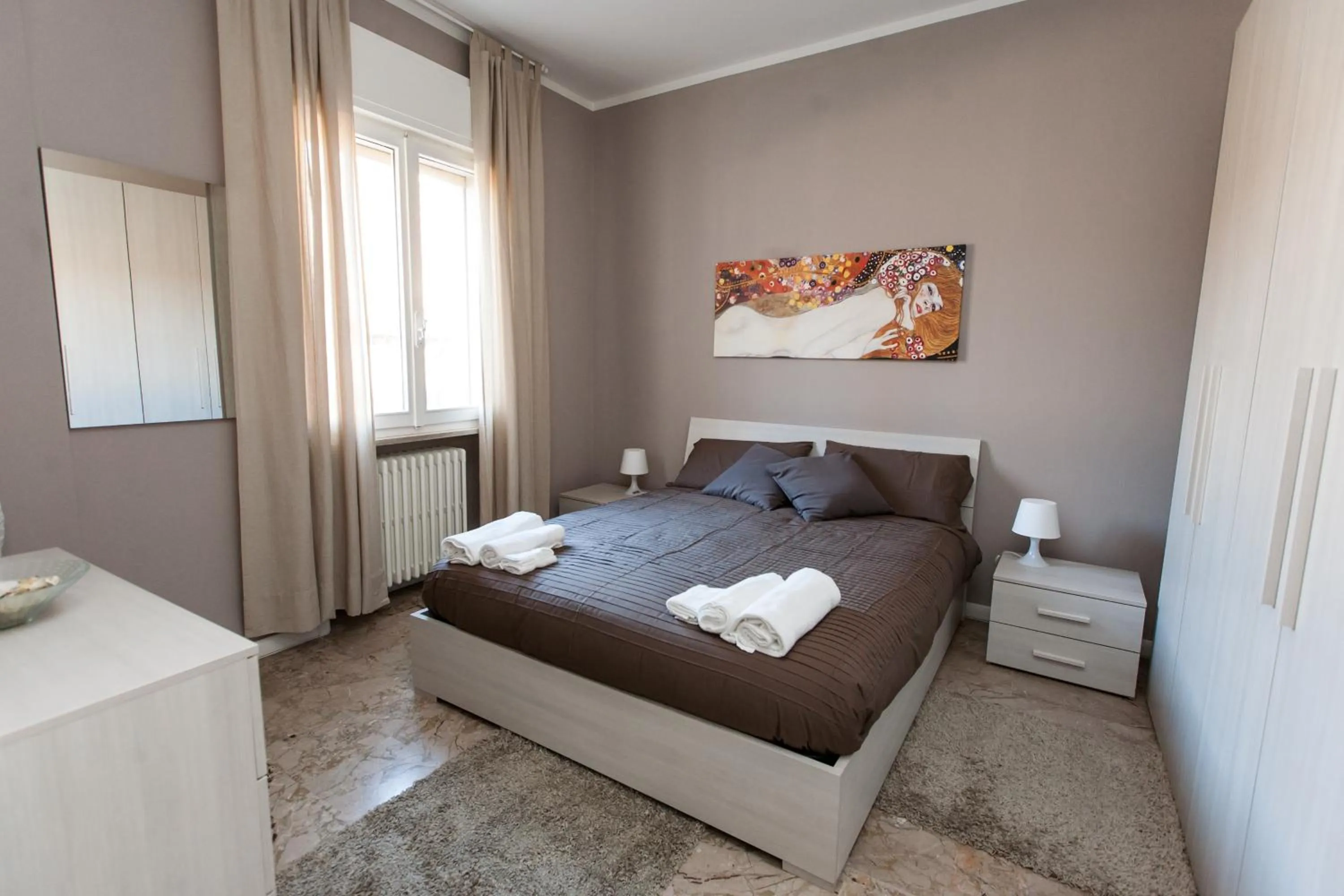 Bed in Apartment Hotel Marchesini