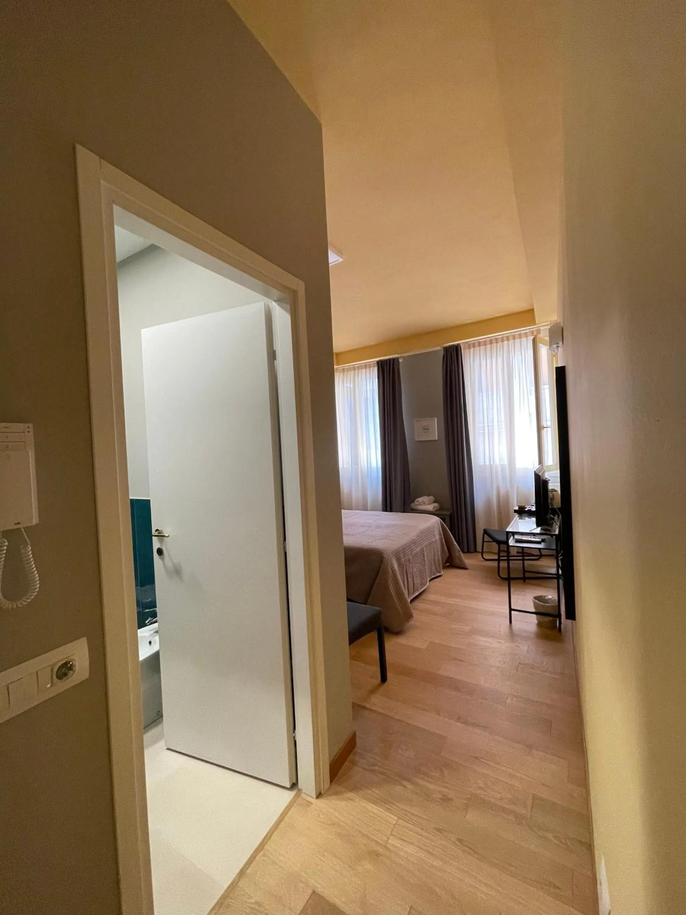 Bed in Apartment Hotel Marchesini