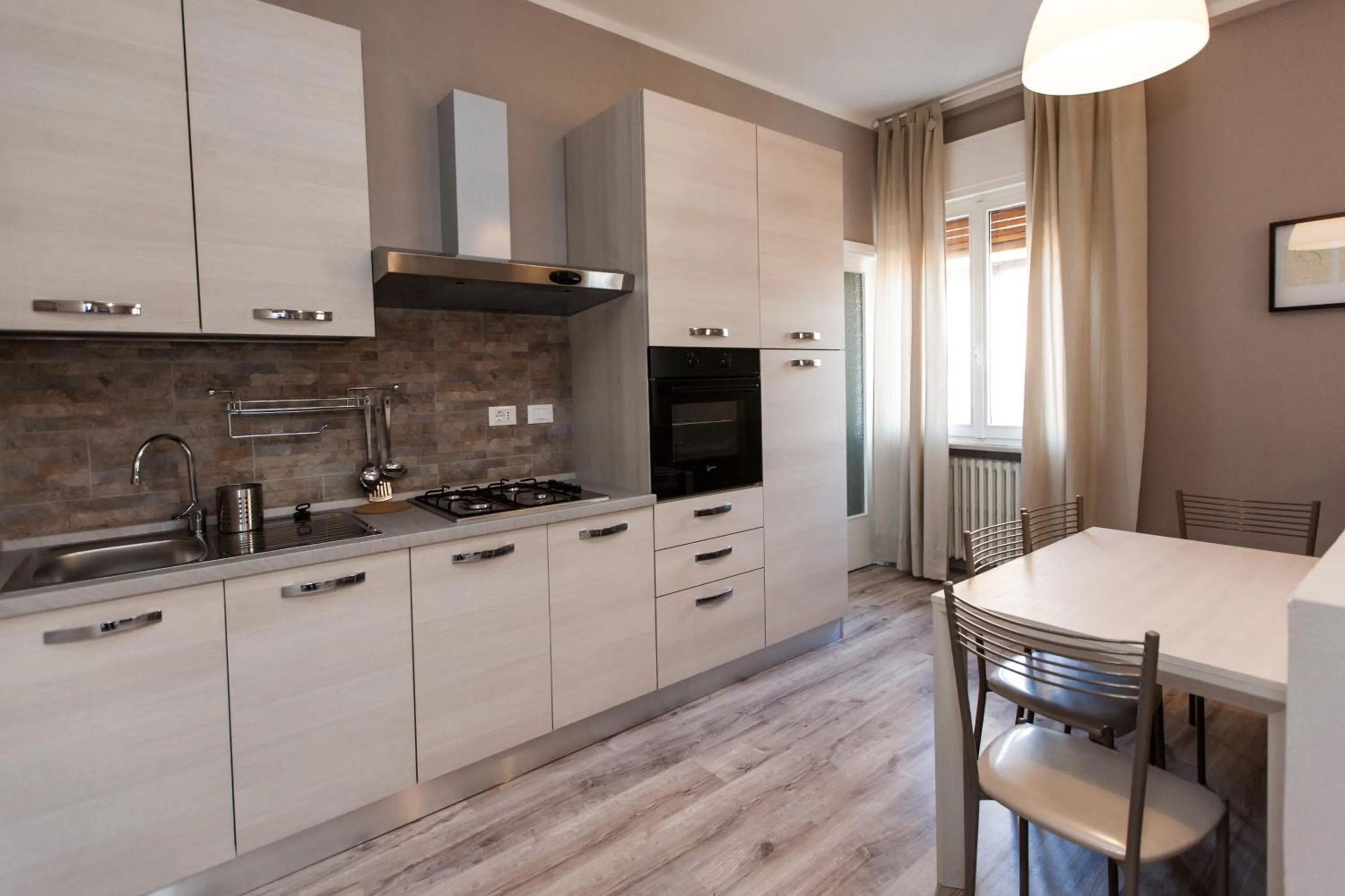 Kitchen or kitchenette in Apartment Hotel Marchesini