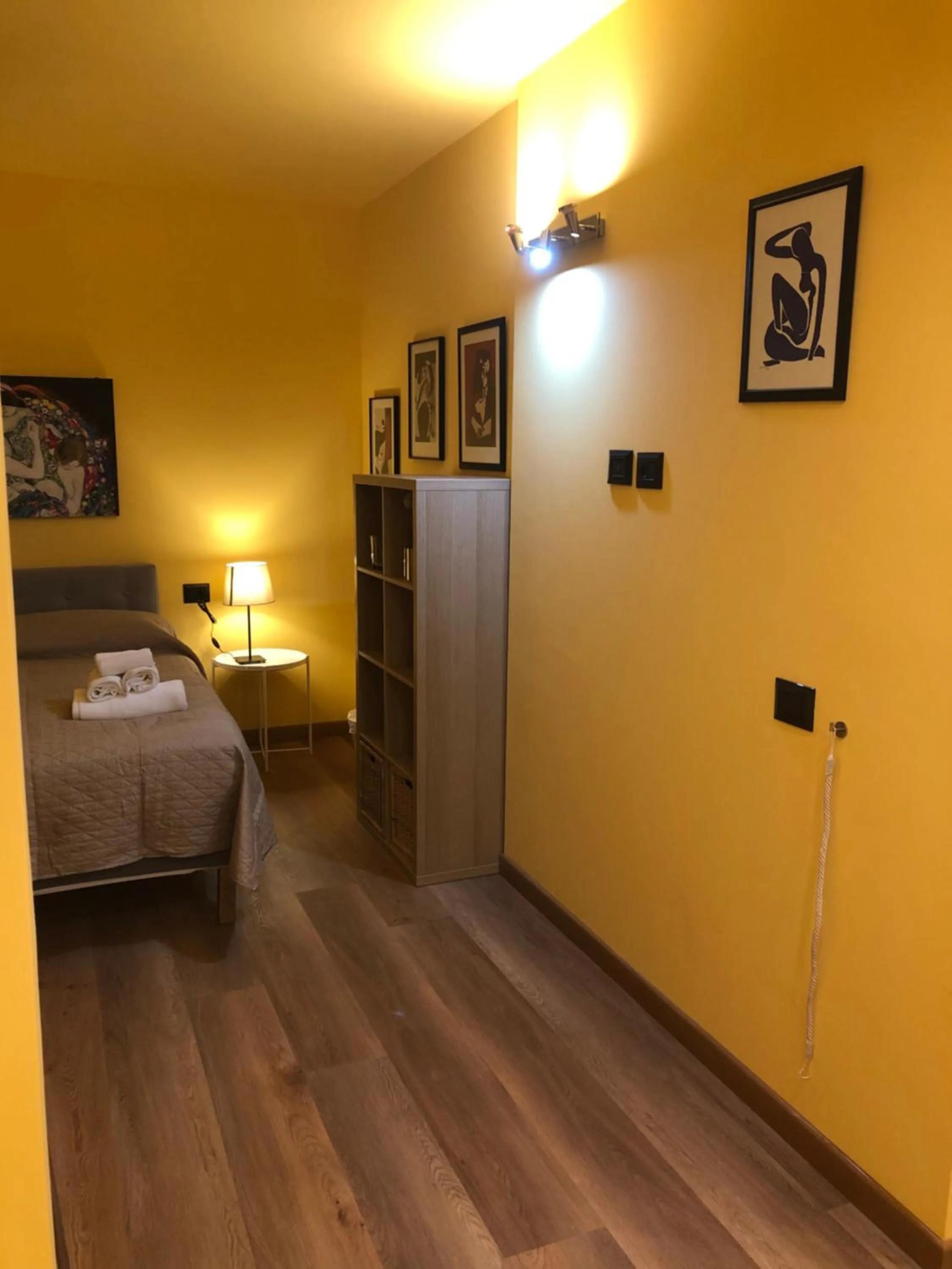 Bed in Apartment Hotel Marchesini