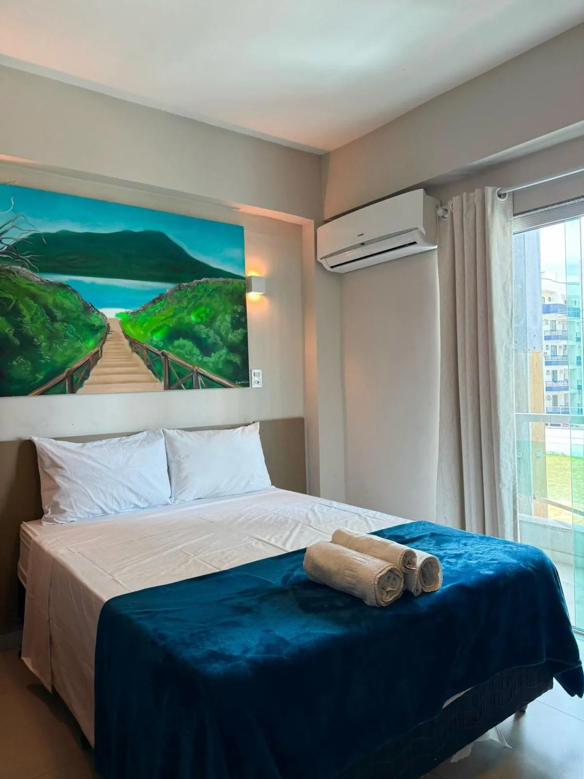 Bed in Pousada La Acolhida