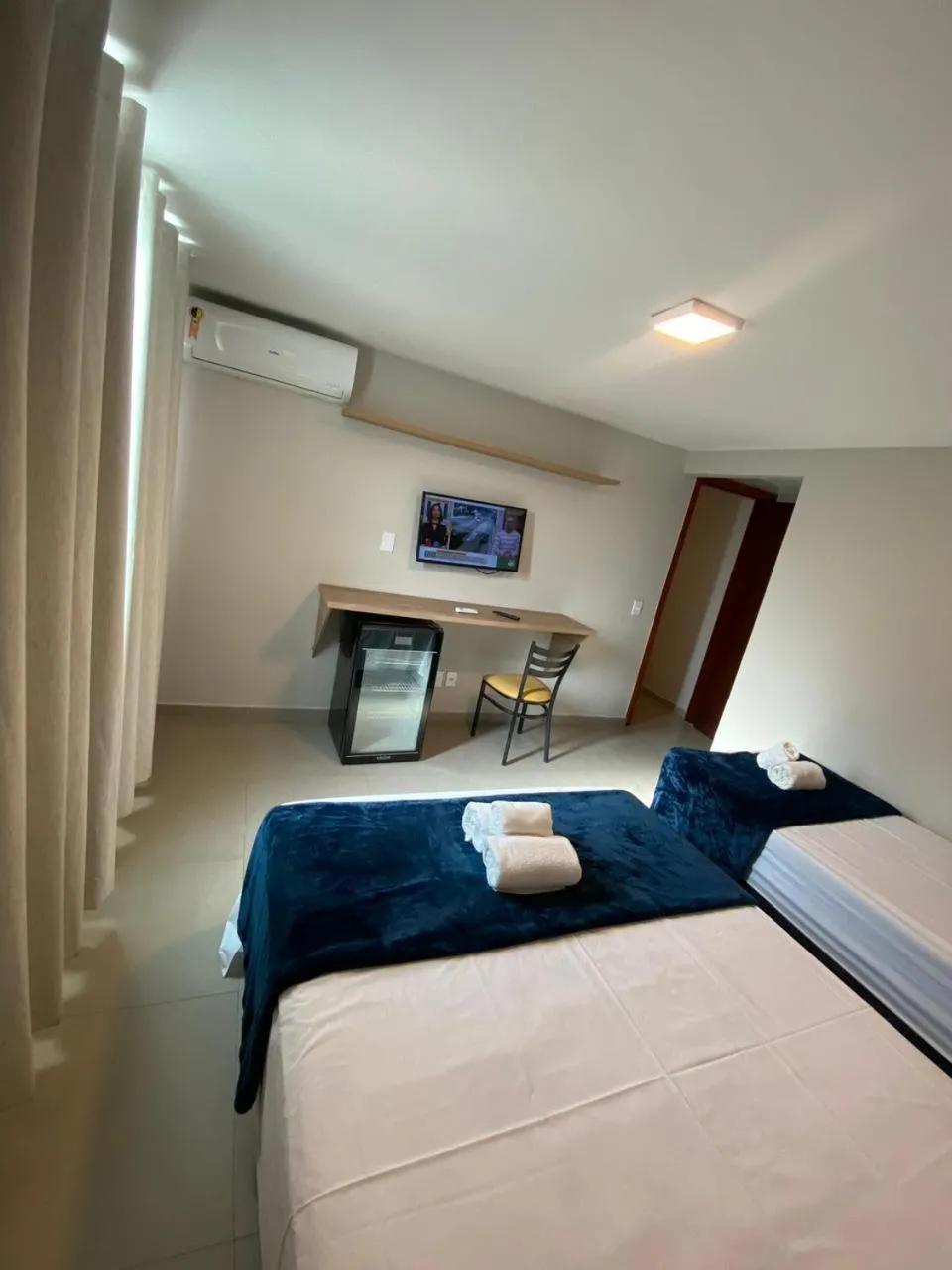 Bed in Pousada La Acolhida