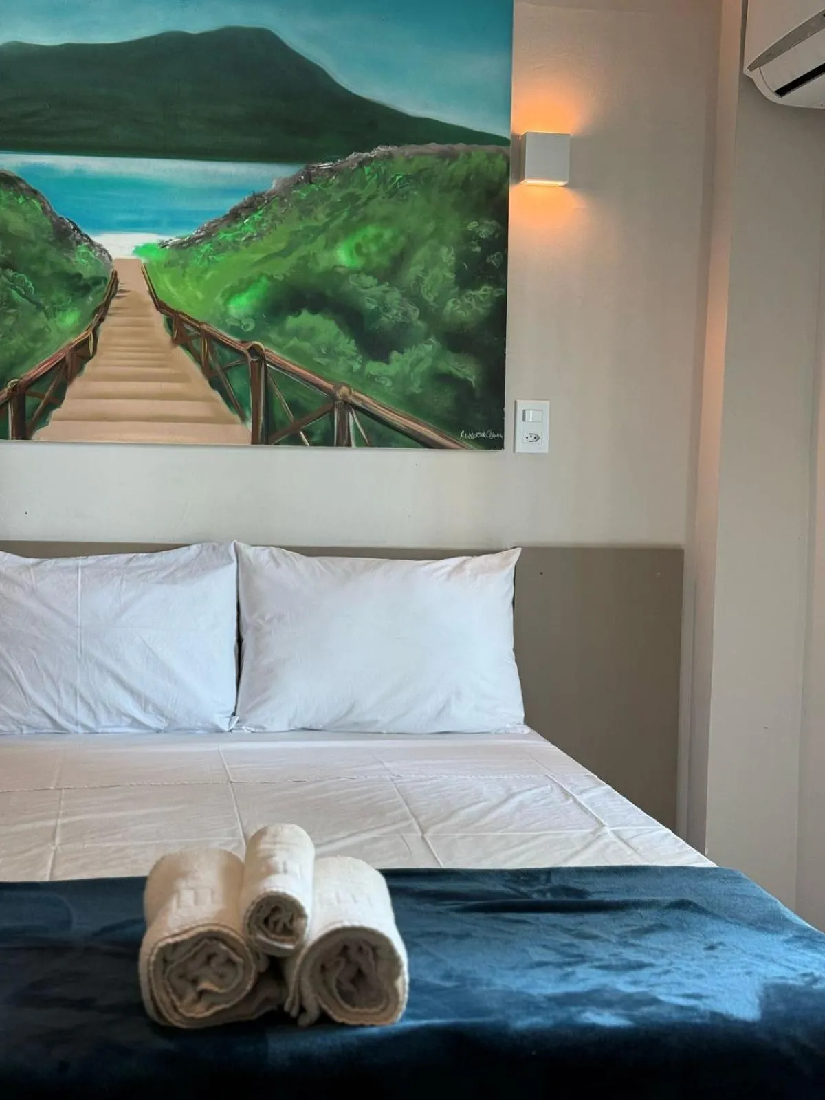 Bed in Pousada La Acolhida