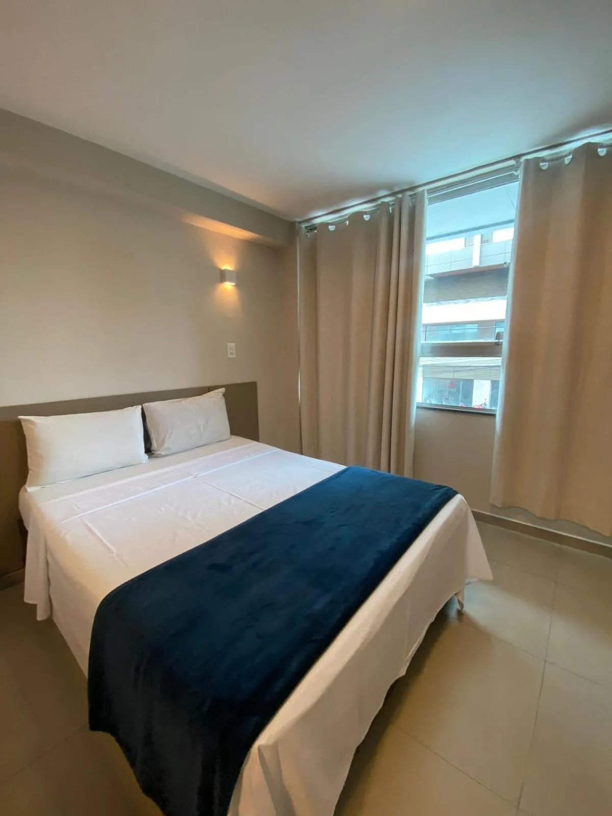 Bed in Pousada La Acolhida