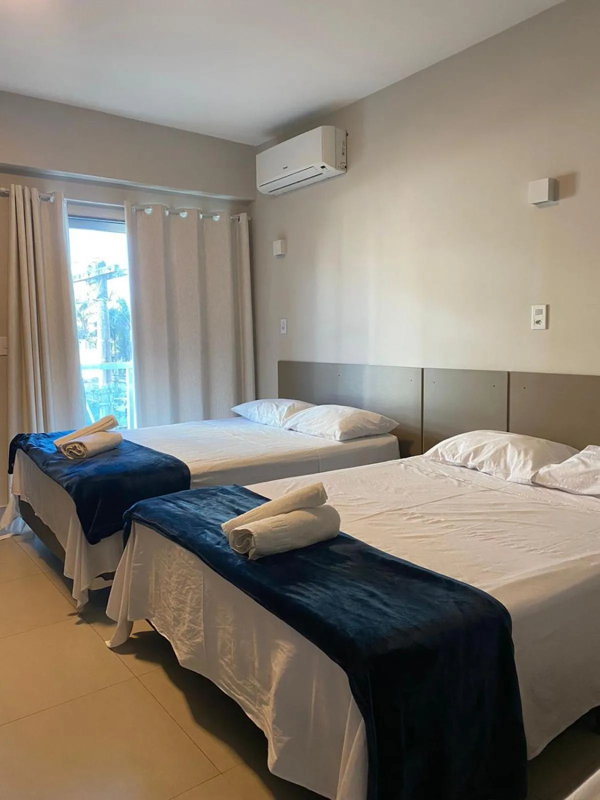 Bed in Pousada La Acolhida