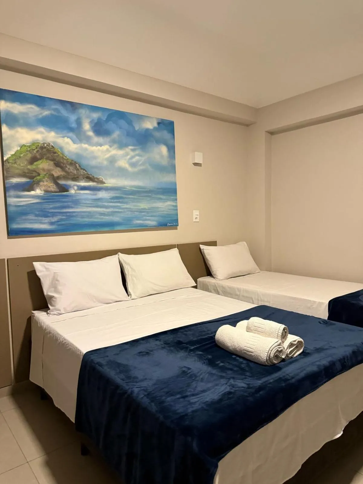 Bed in Pousada La Acolhida