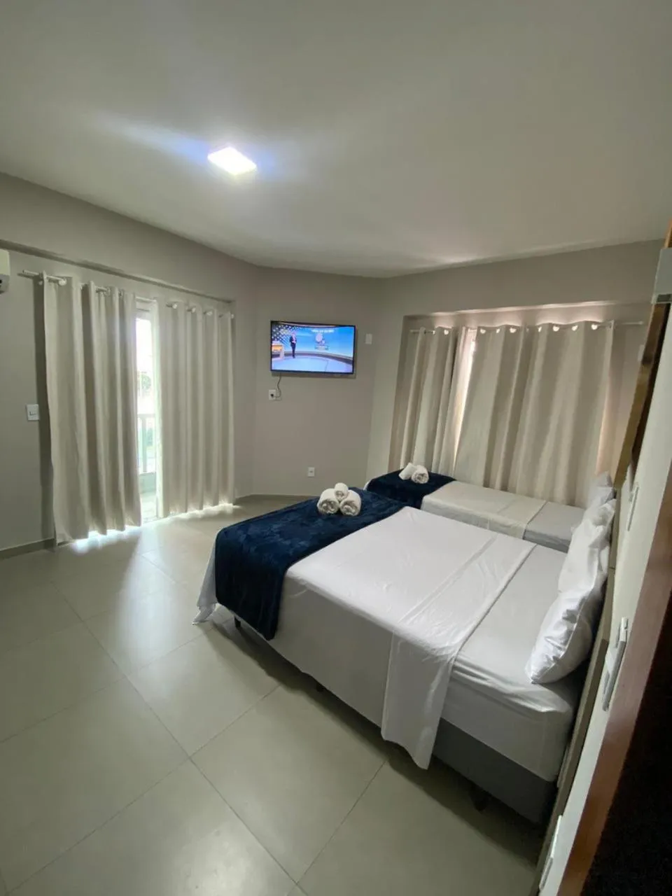 Bed in Pousada La Acolhida