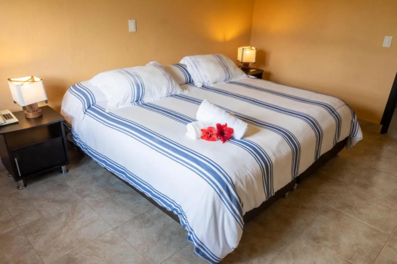 Photo of the whole room, Bed in San Agustin Internacional Hotel