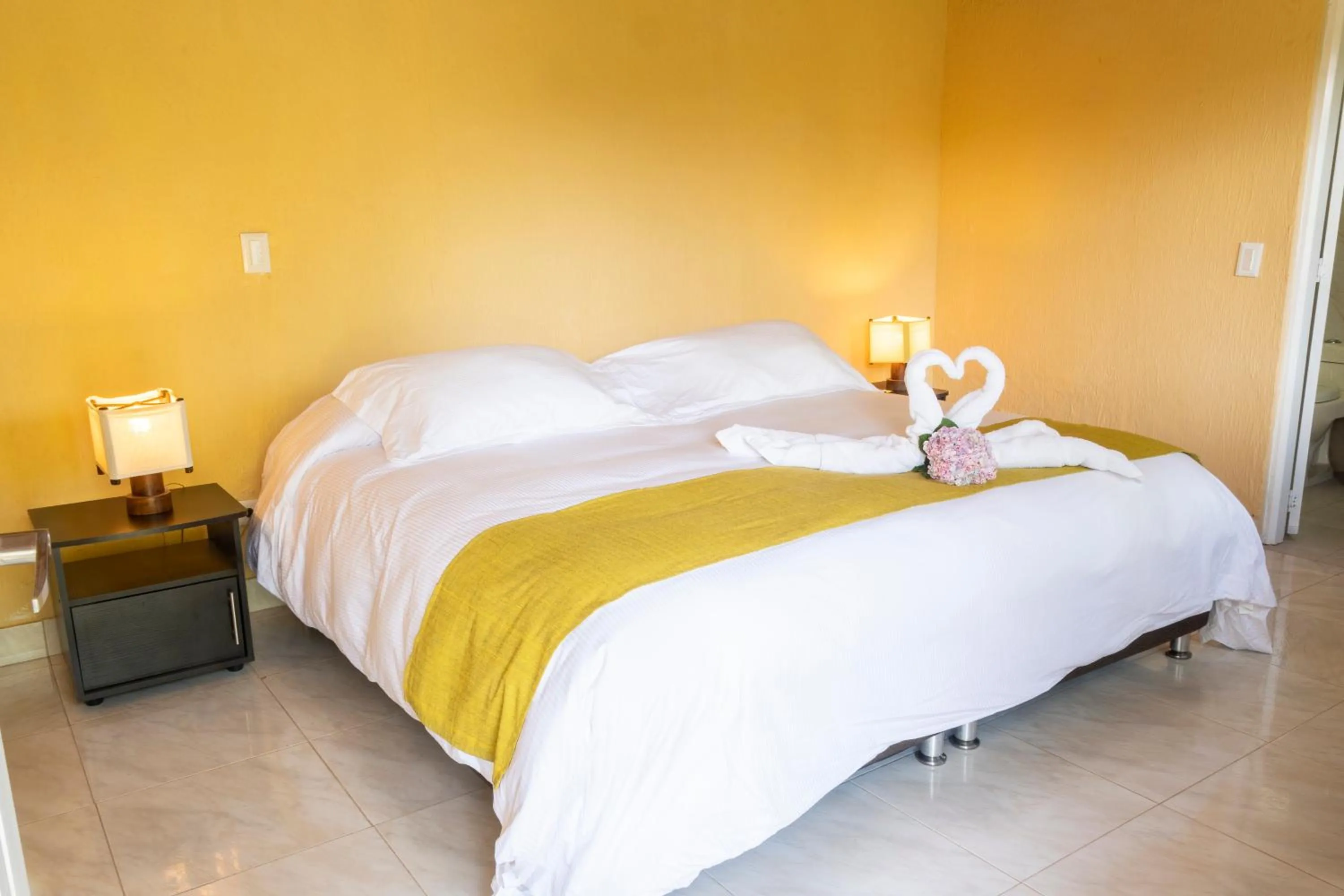 Photo of the whole room, Bed in San Agustin Internacional Hotel