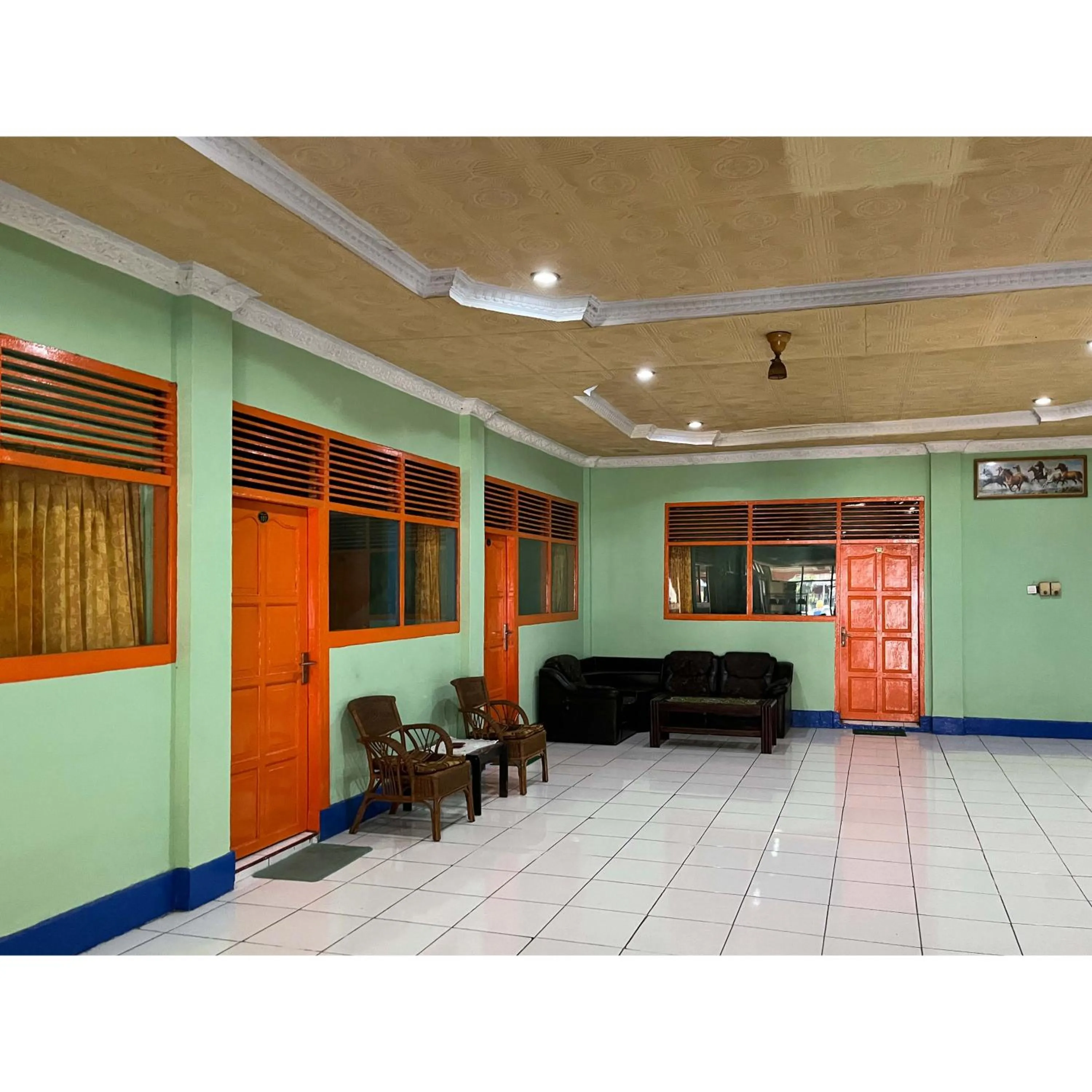 Seating area in Afiat Hotel Maros Makassar RedPartner