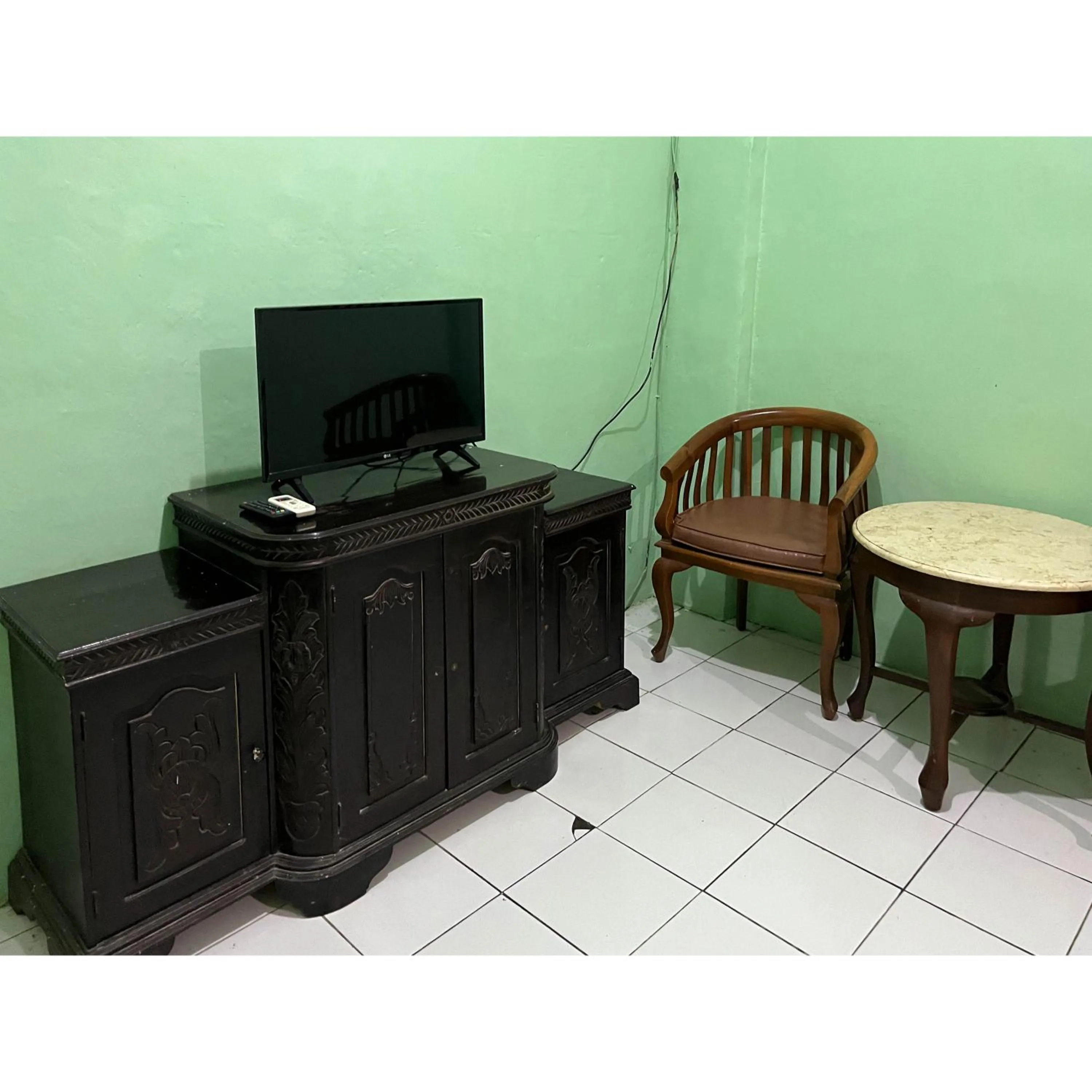 Bedroom in Afiat Hotel Maros Makassar RedPartner