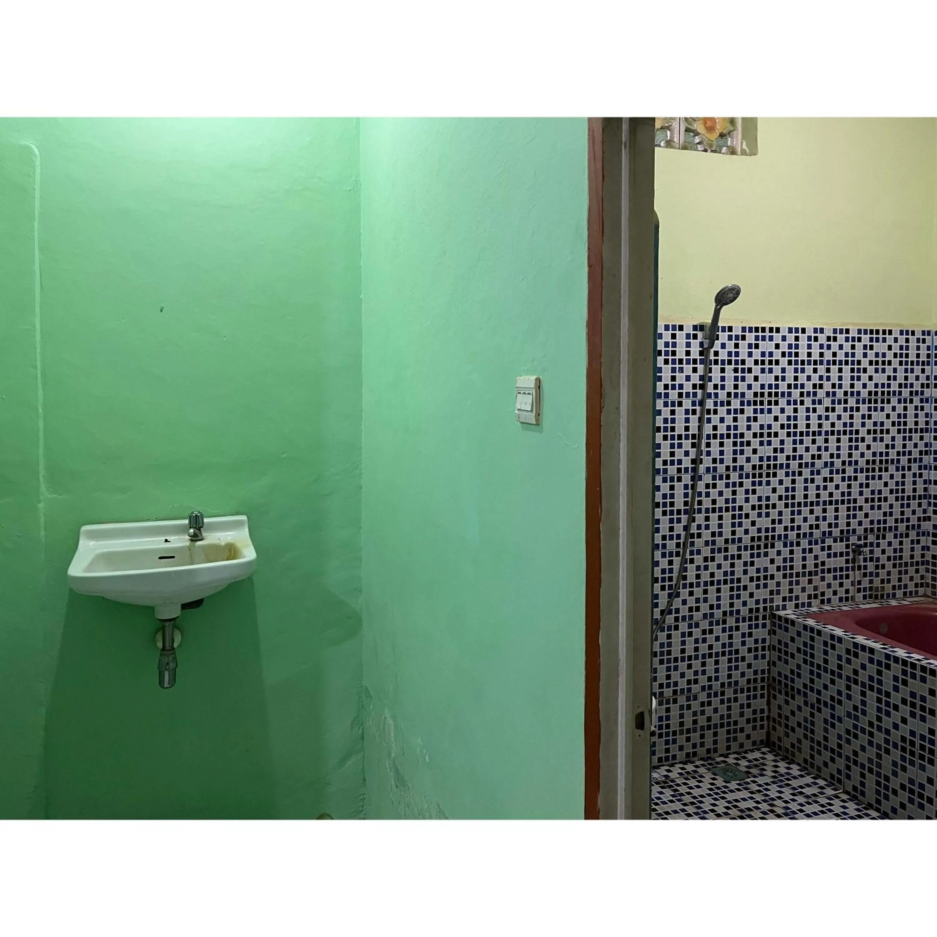 Bathroom in Afiat Hotel Maros Makassar RedPartner