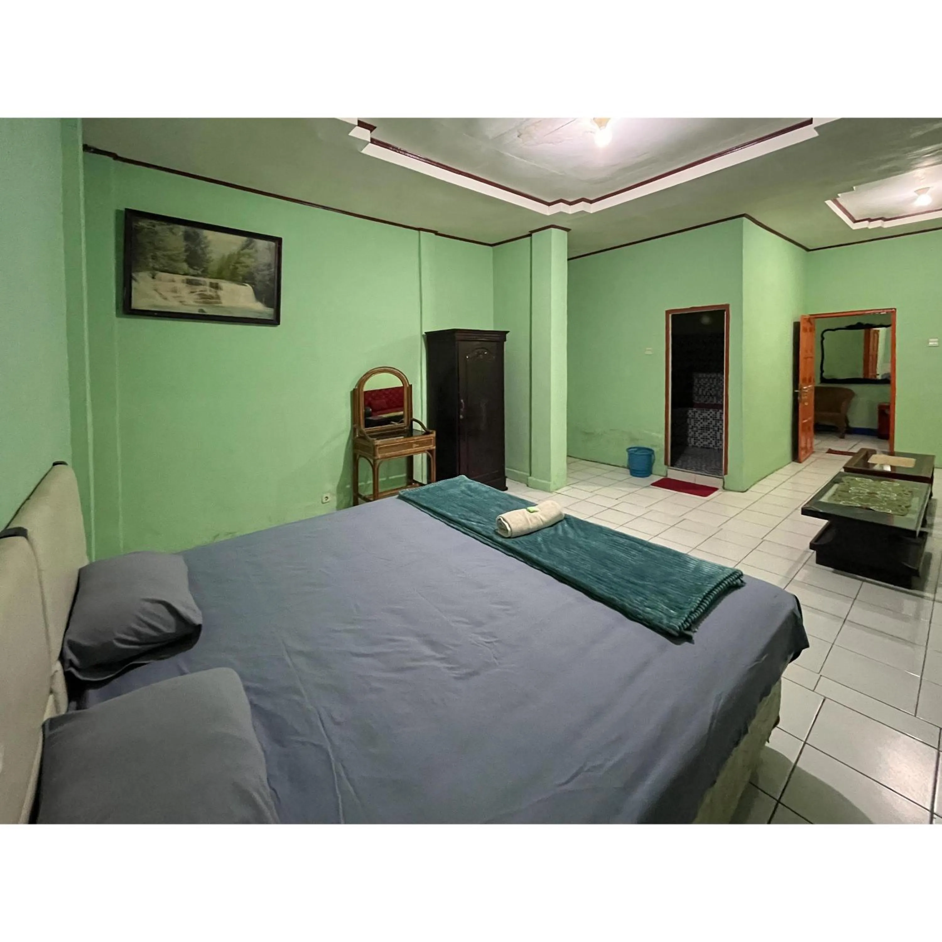 Bedroom, Bed in Afiat Hotel Maros Makassar RedPartner