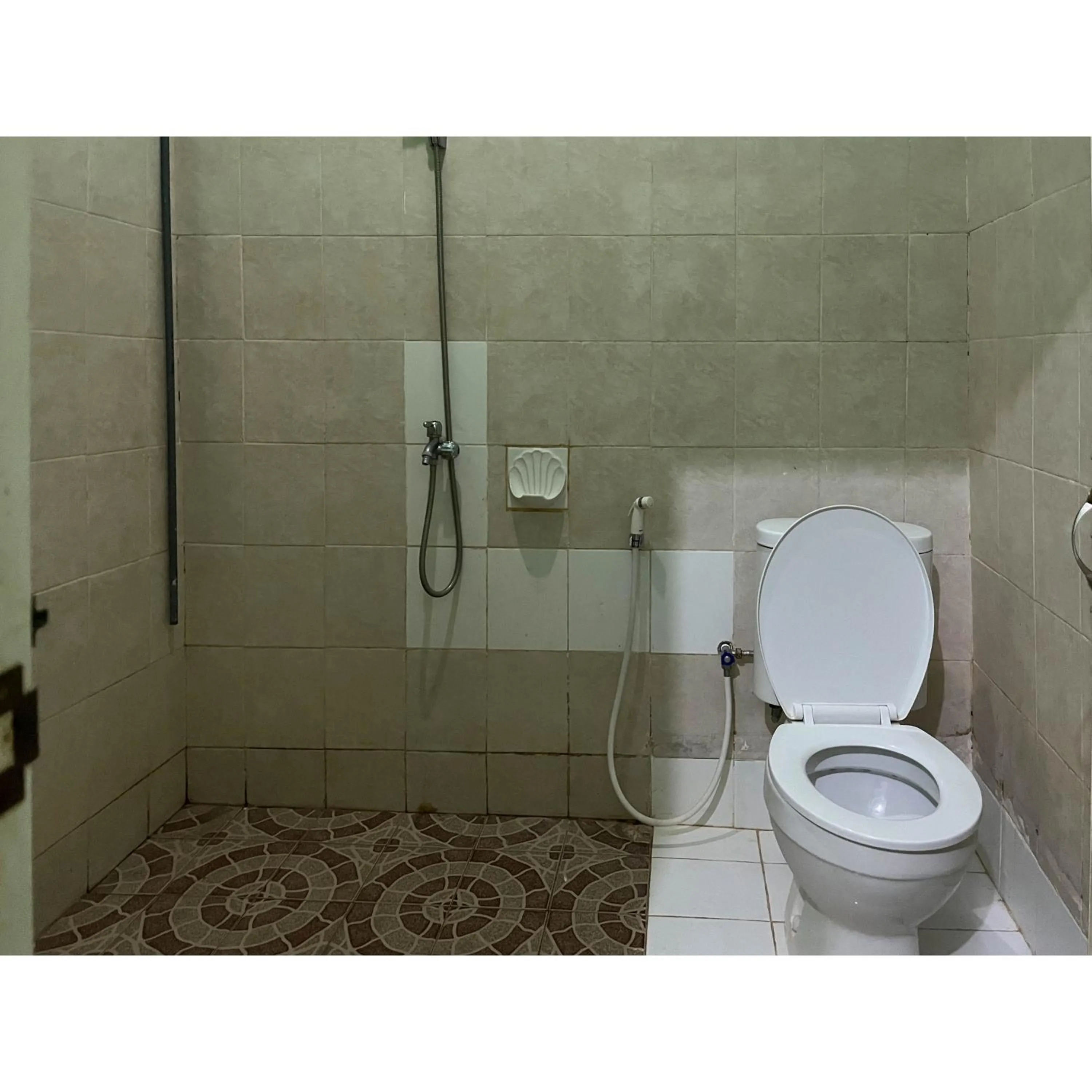 Bathroom in Afiat Hotel Maros Makassar RedPartner