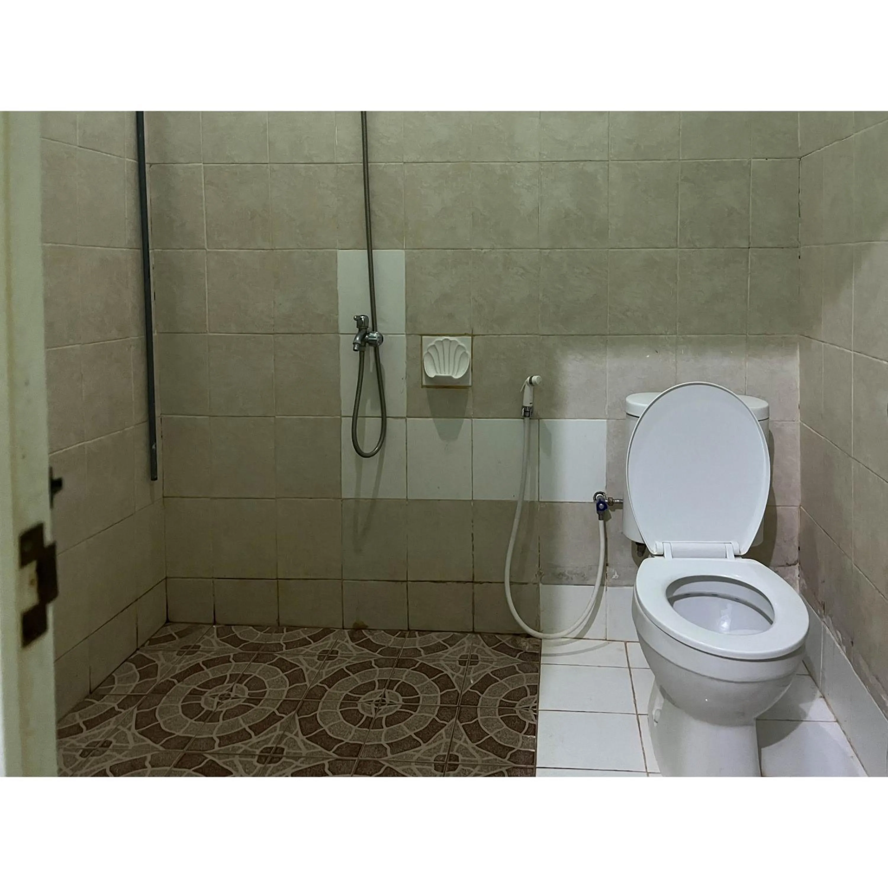 Bathroom in Afiat Hotel Maros Makassar RedPartner