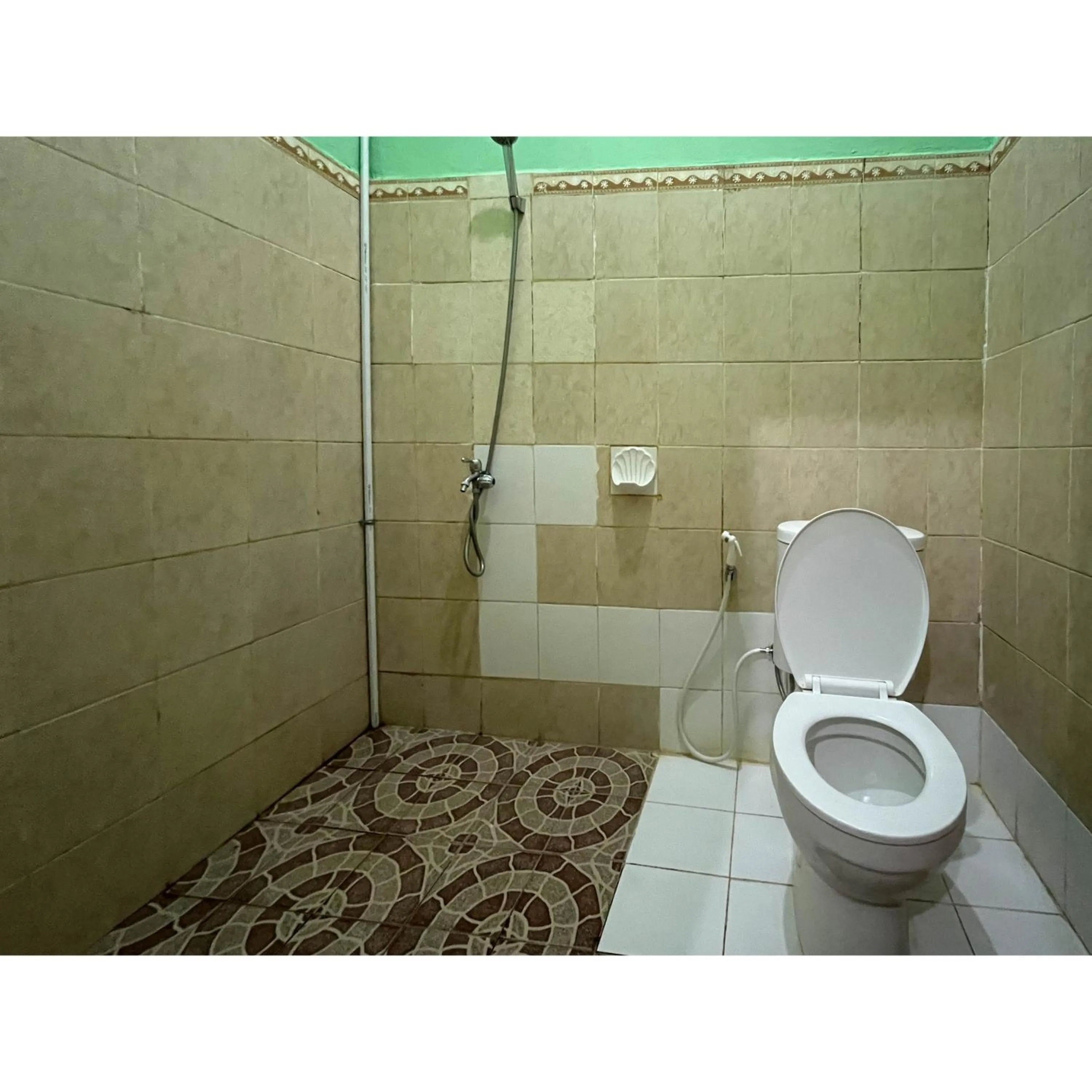 Bathroom in Afiat Hotel Maros Makassar RedPartner