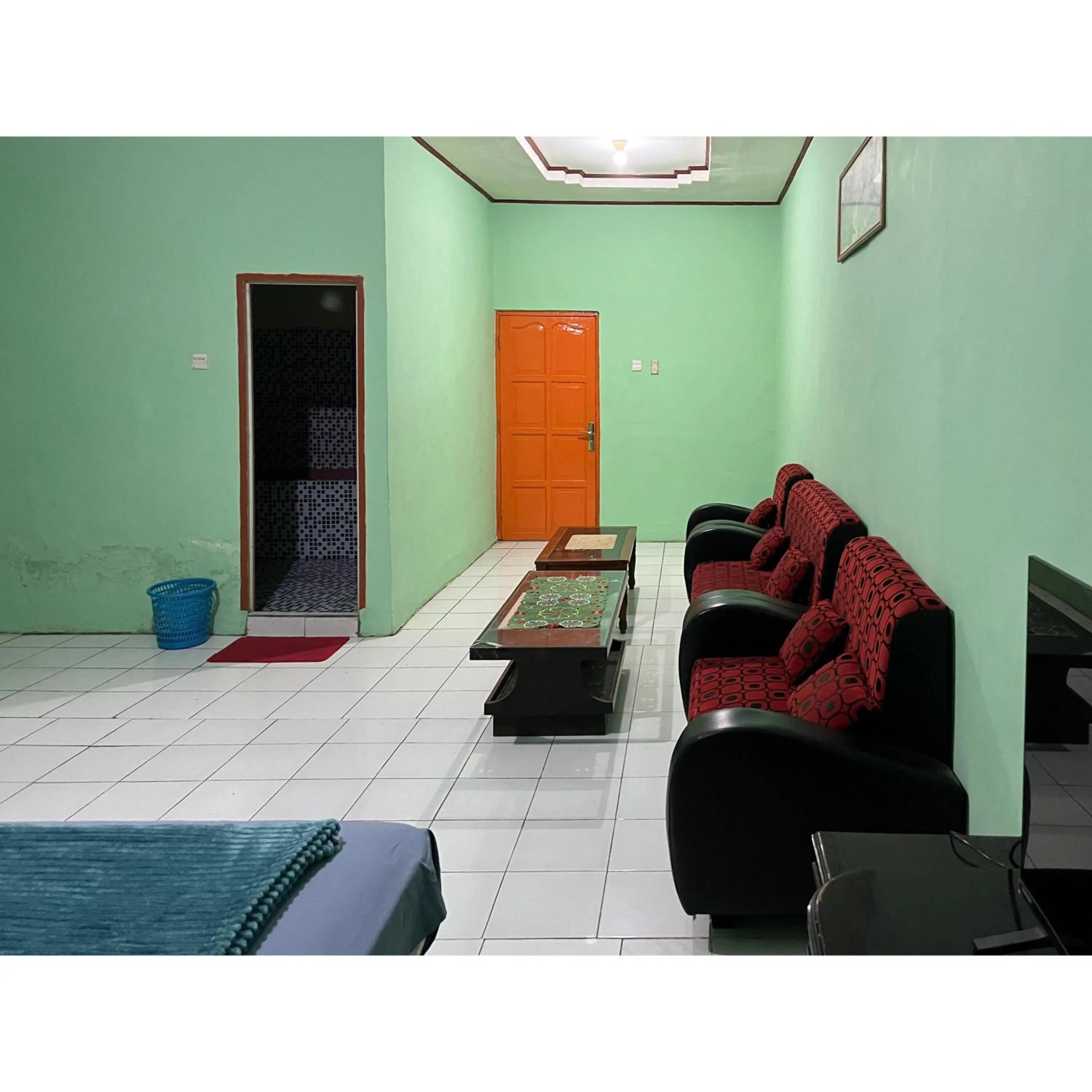 Seating area in Afiat Hotel Maros Makassar RedPartner