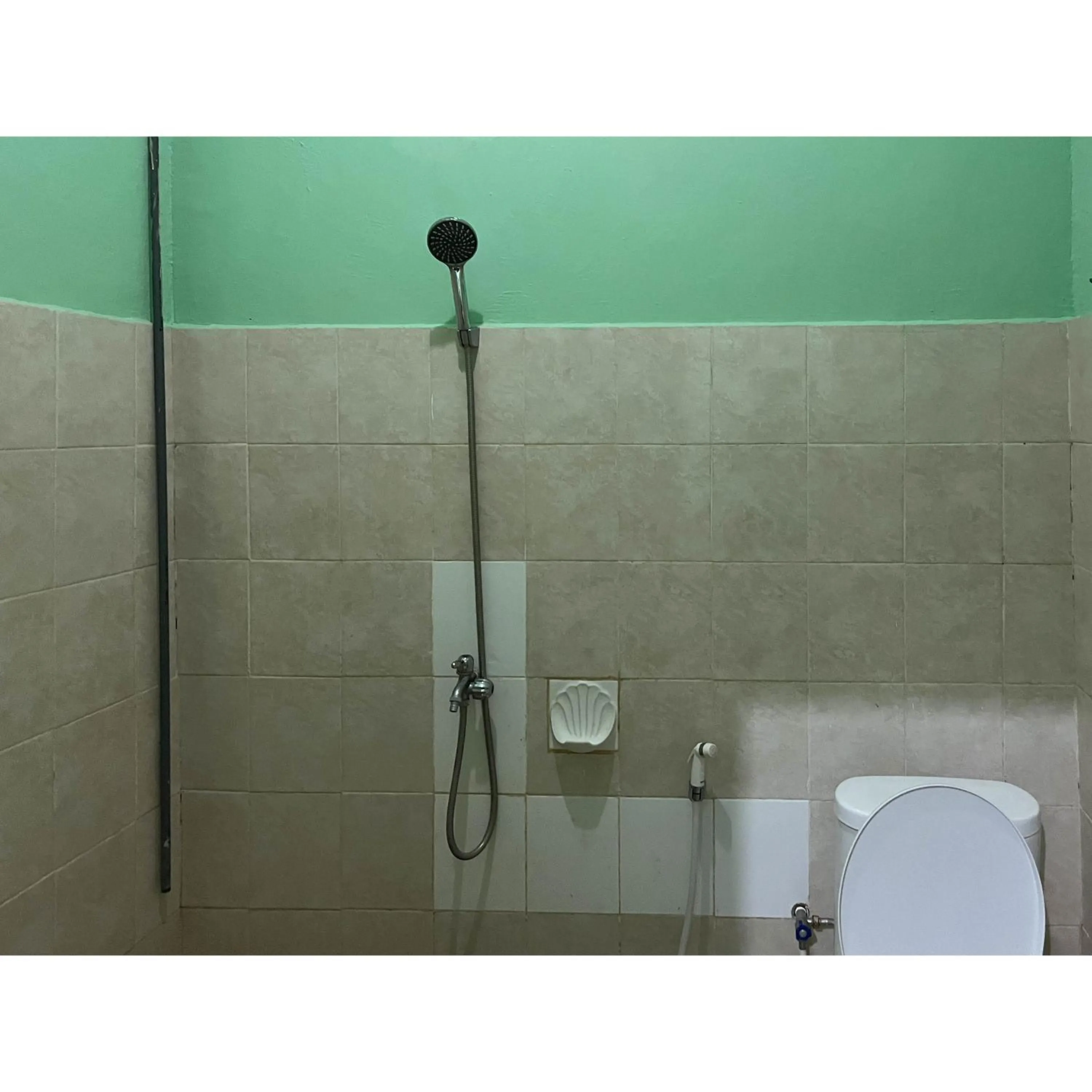 Bathroom in Afiat Hotel Maros Makassar RedPartner