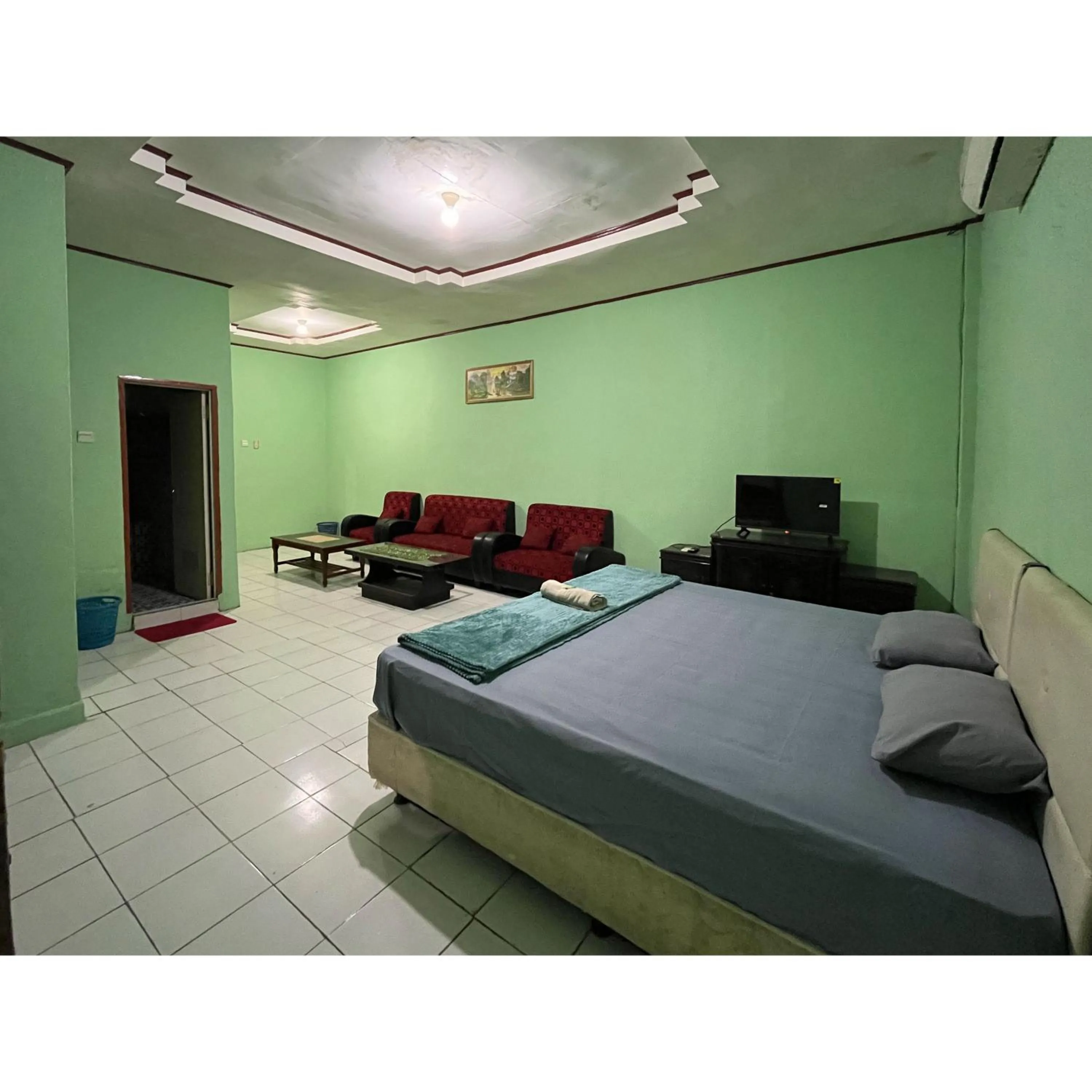Bedroom, Bed in Afiat Hotel Maros Makassar RedPartner