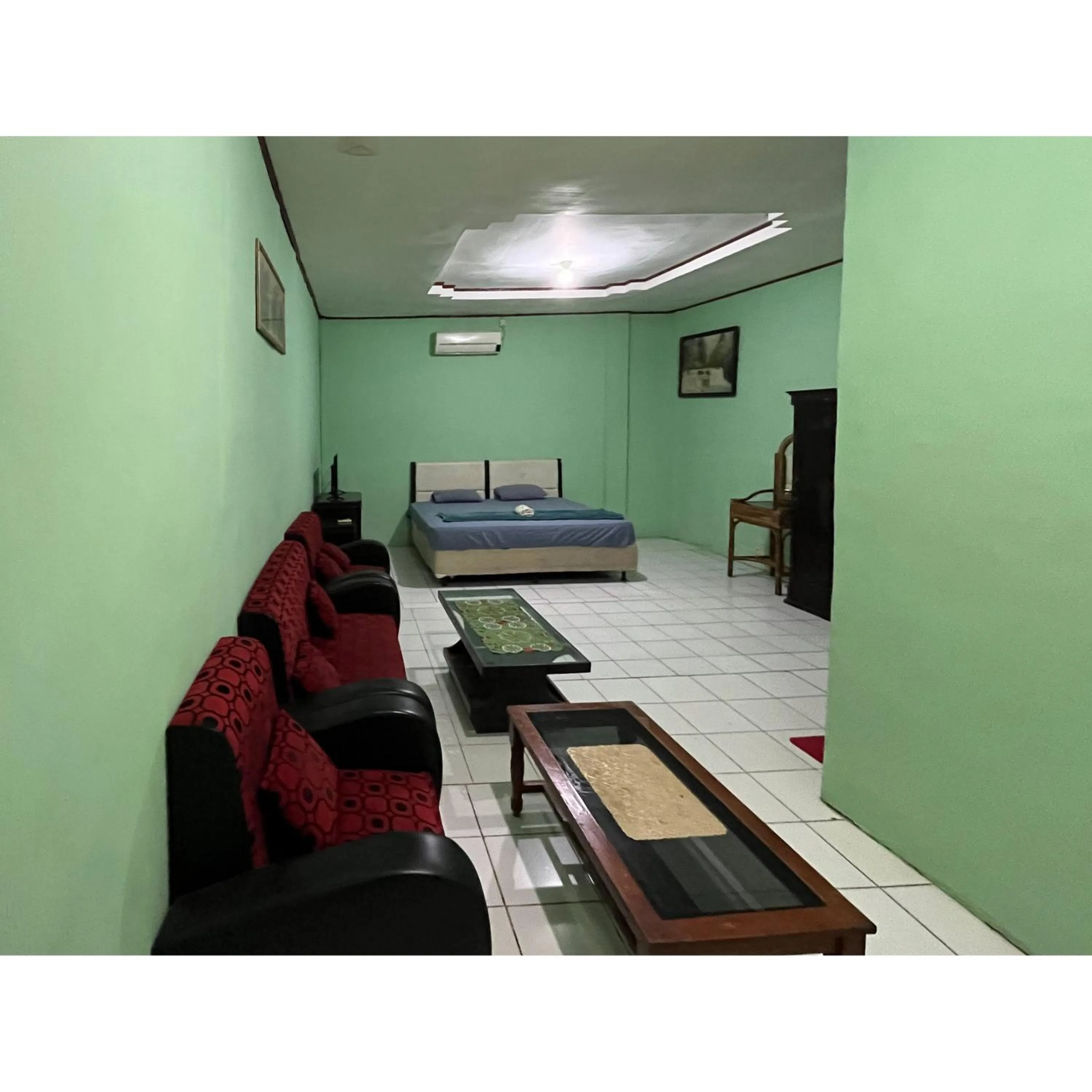 Bedroom, Bed in Afiat Hotel Maros Makassar RedPartner