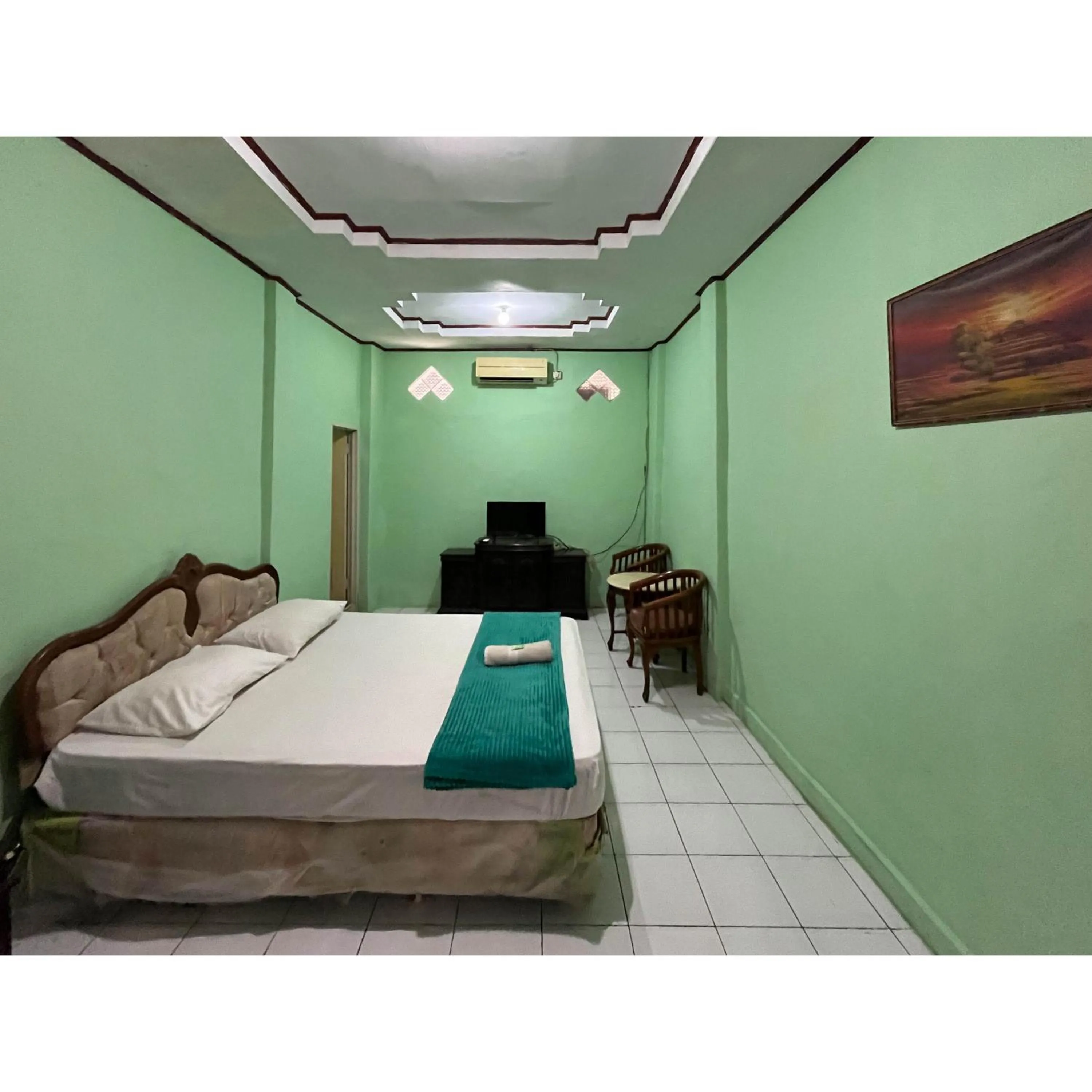 Bedroom, Bed in Afiat Hotel Maros Makassar RedPartner