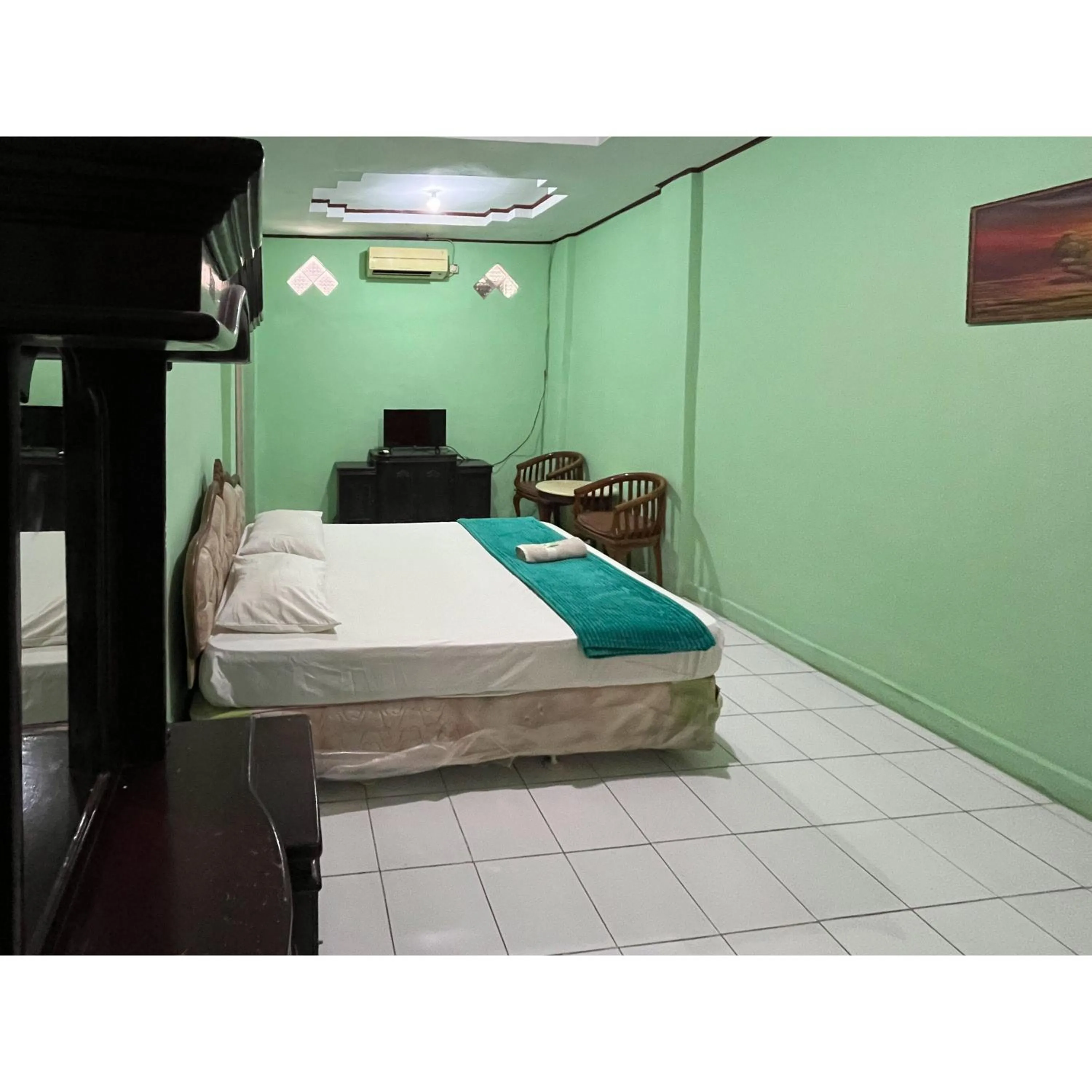 Bedroom, Bed in Afiat Hotel Maros Makassar RedPartner