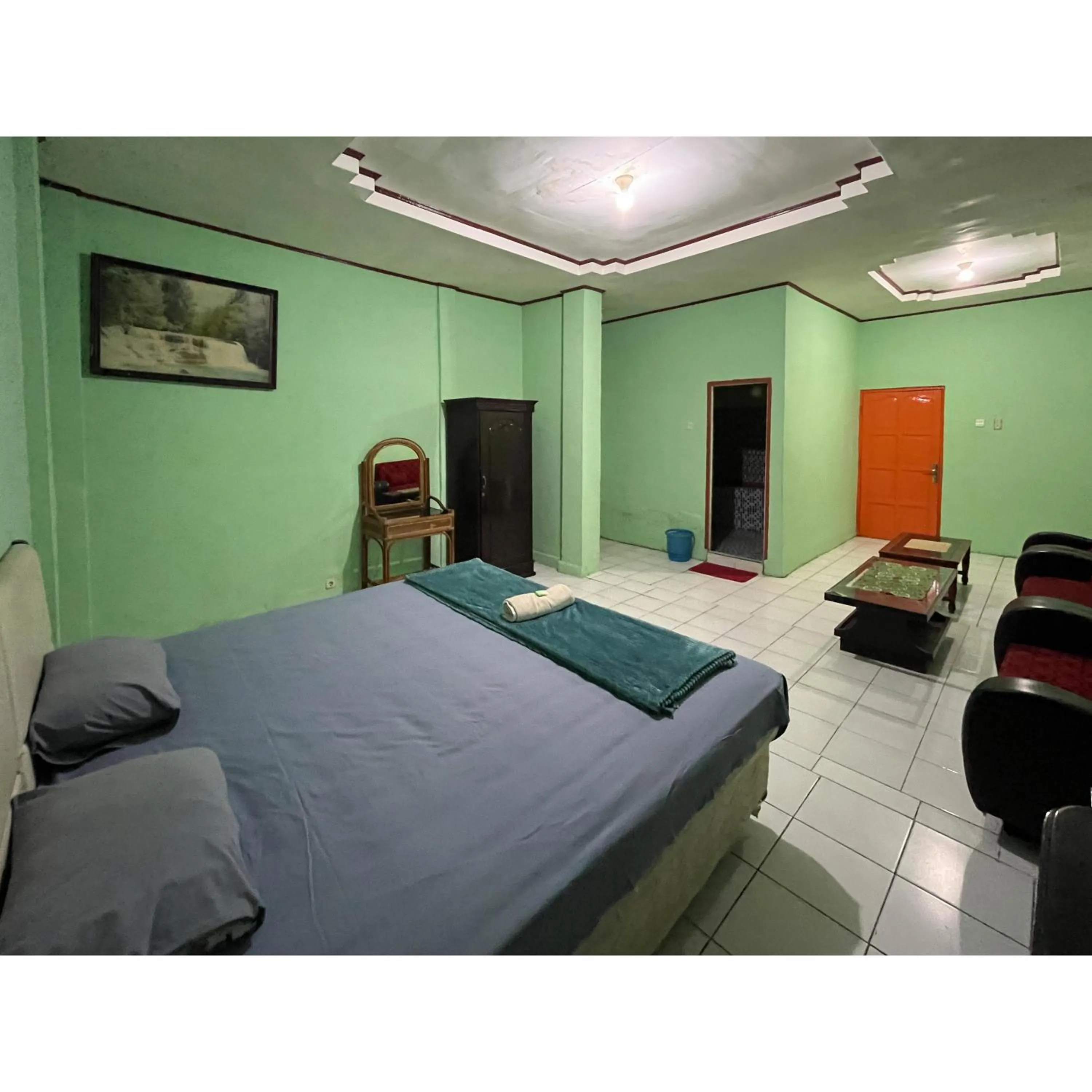 Bedroom, Bed in Afiat Hotel Maros Makassar RedPartner