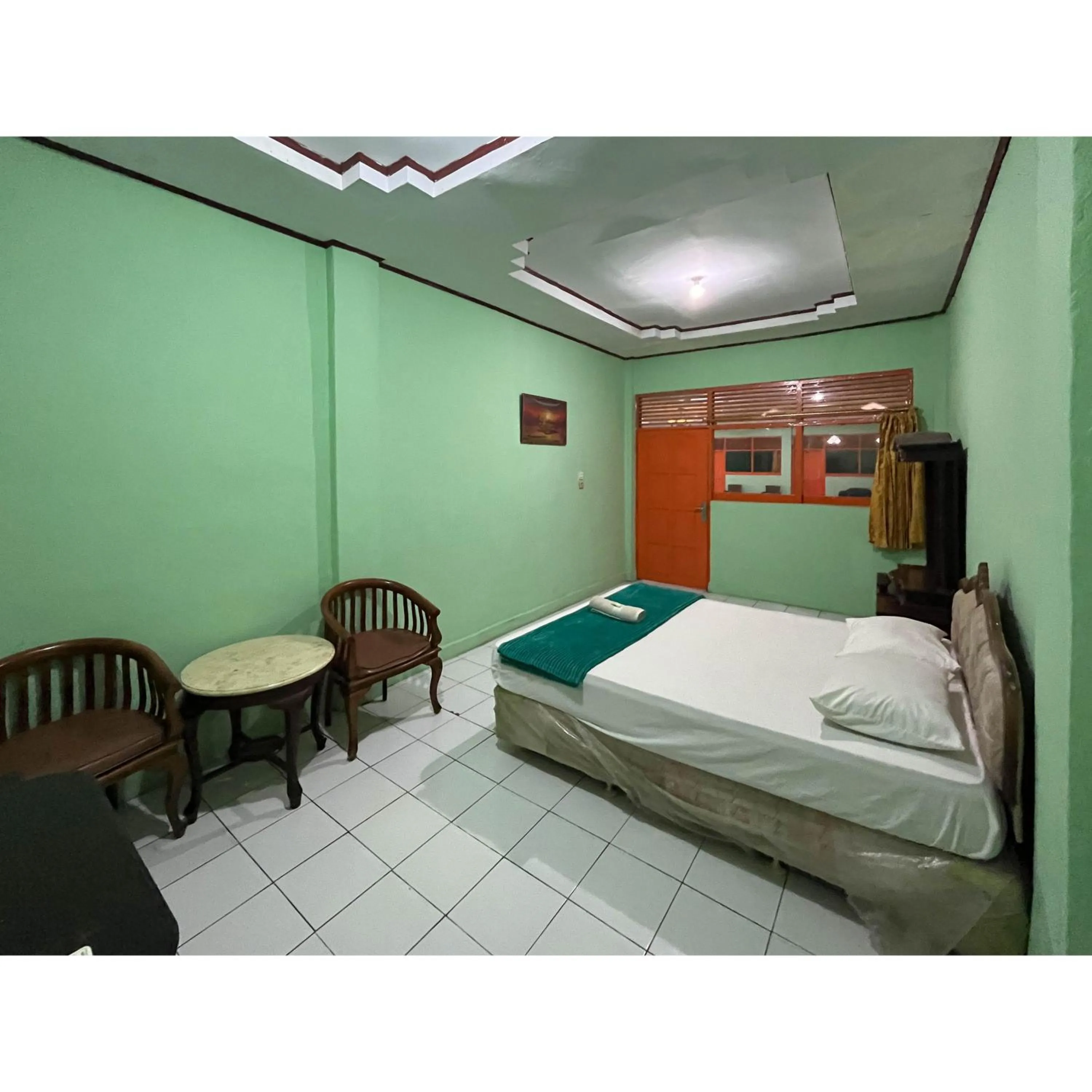 Bedroom, Bed in Afiat Hotel Maros Makassar RedPartner