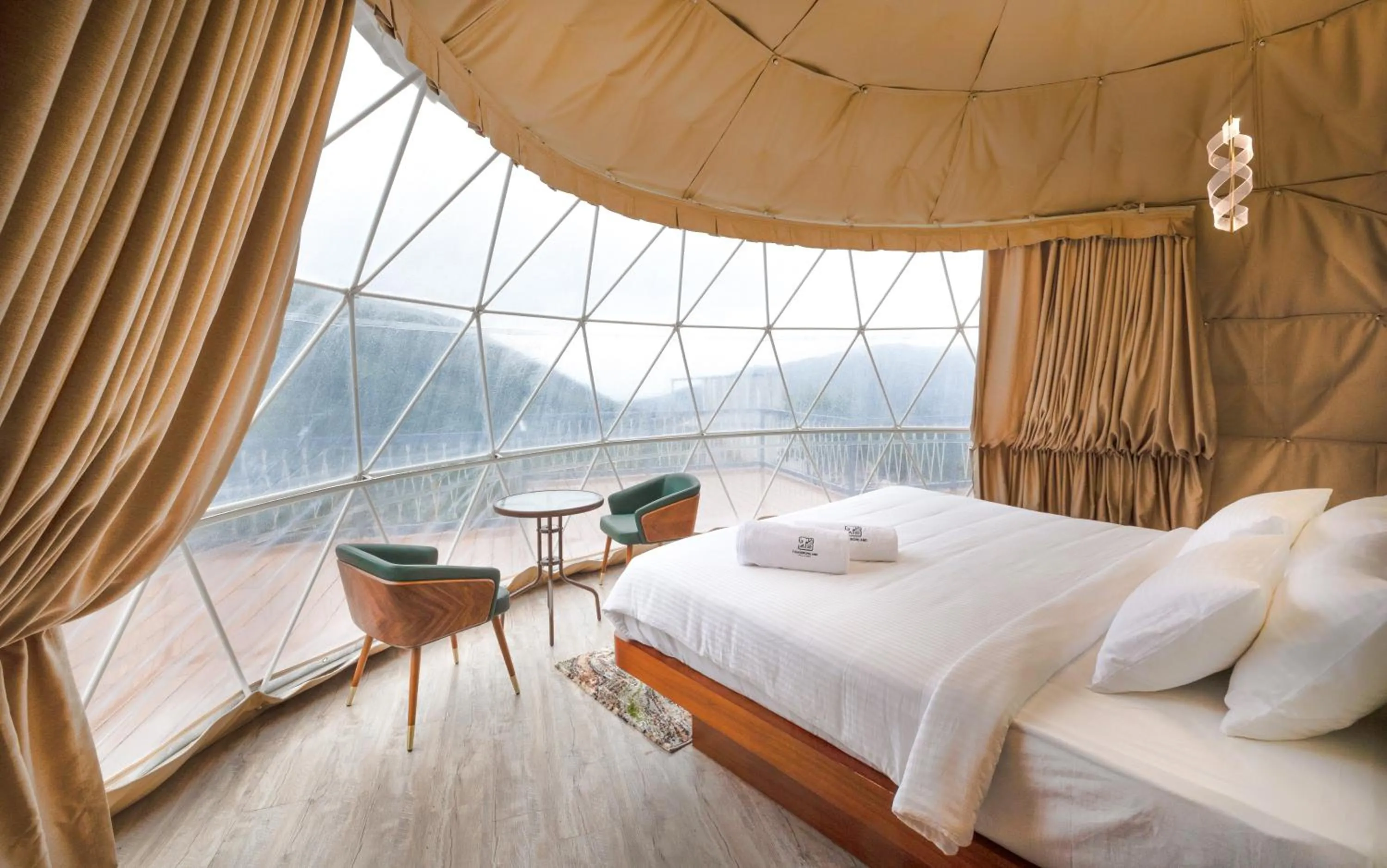 Bed in Tomorrowland Farms and Suites