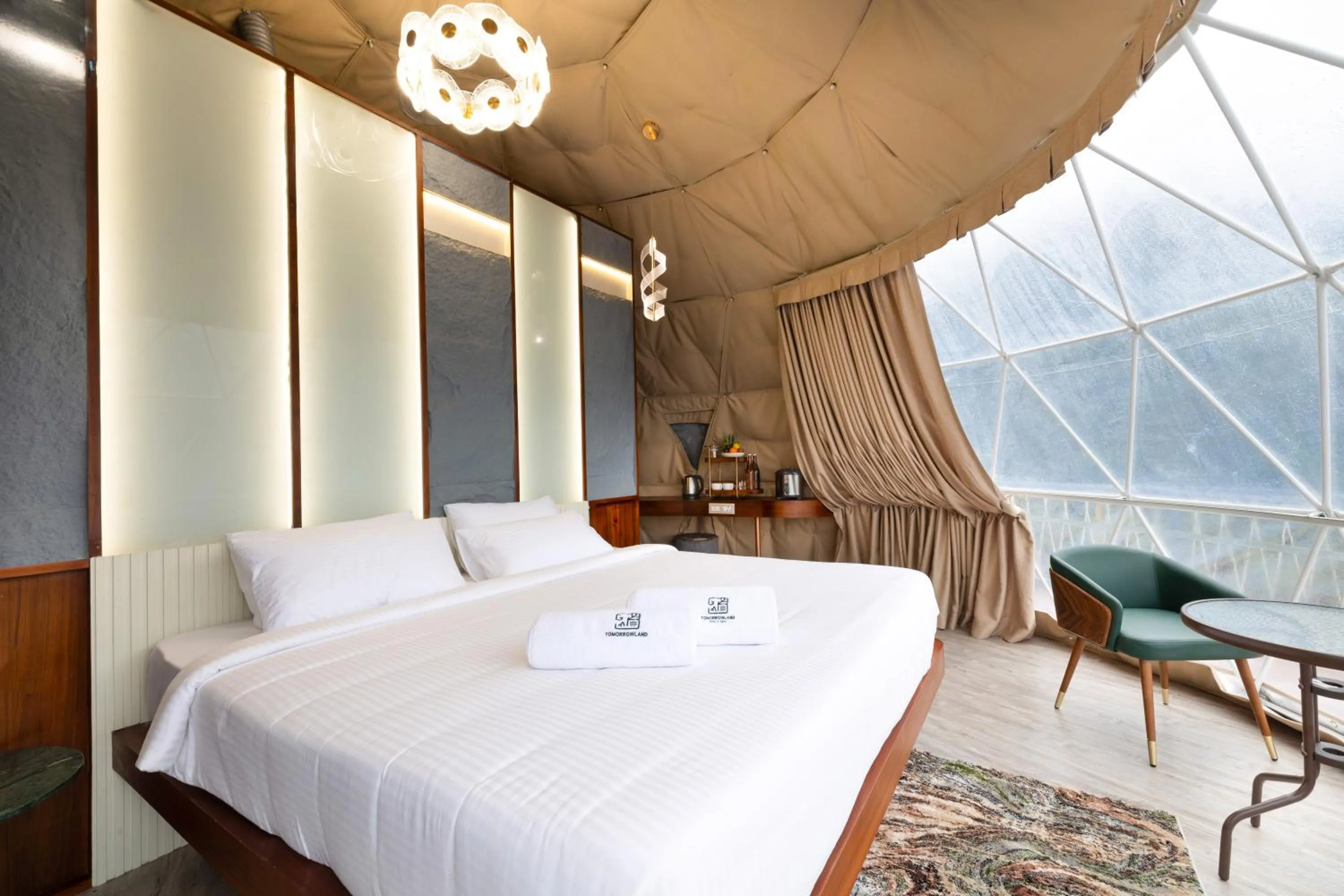 Bed in Tomorrowland Farms and Suites