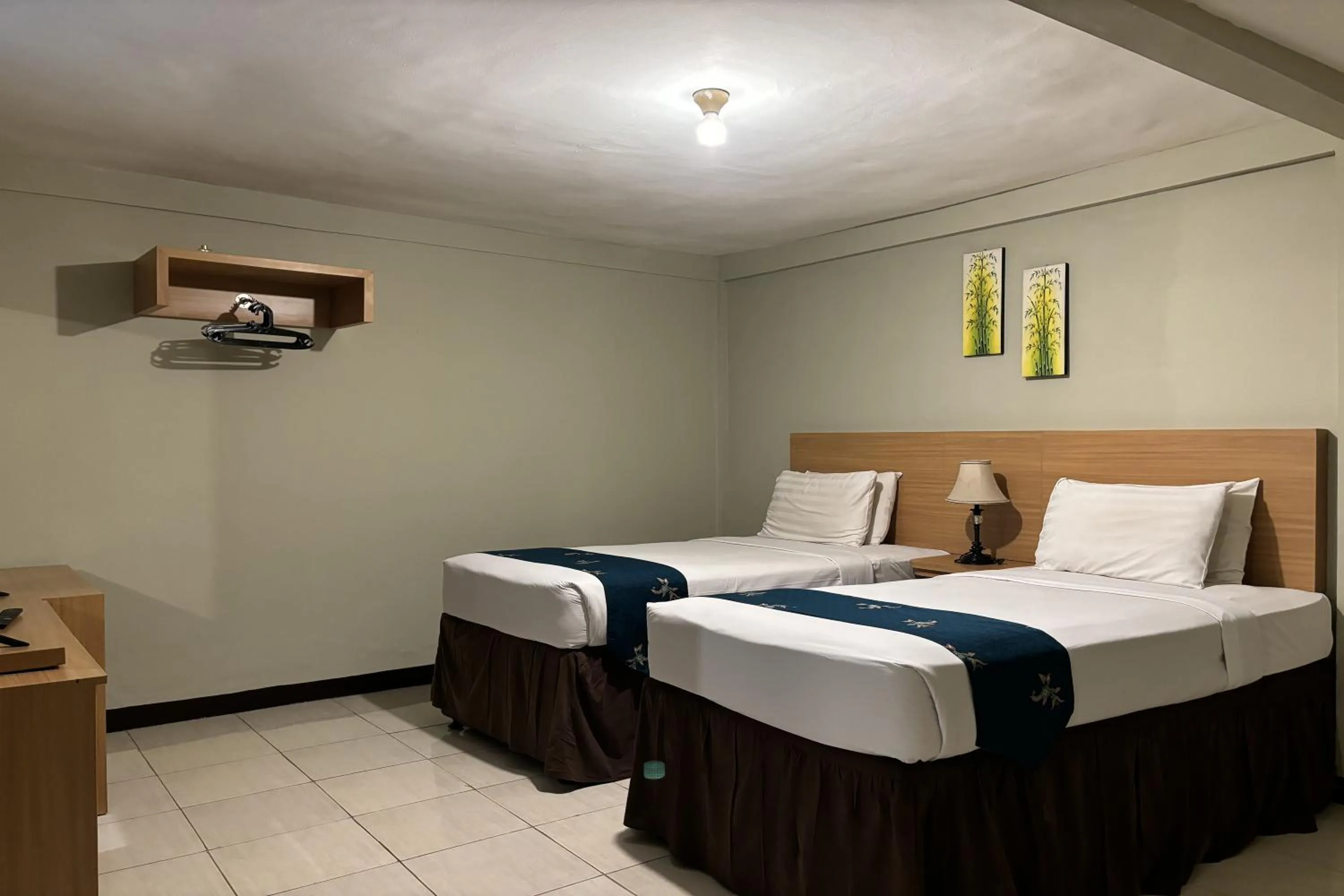 Bed in Hotel Pesona Bamboe Lembang