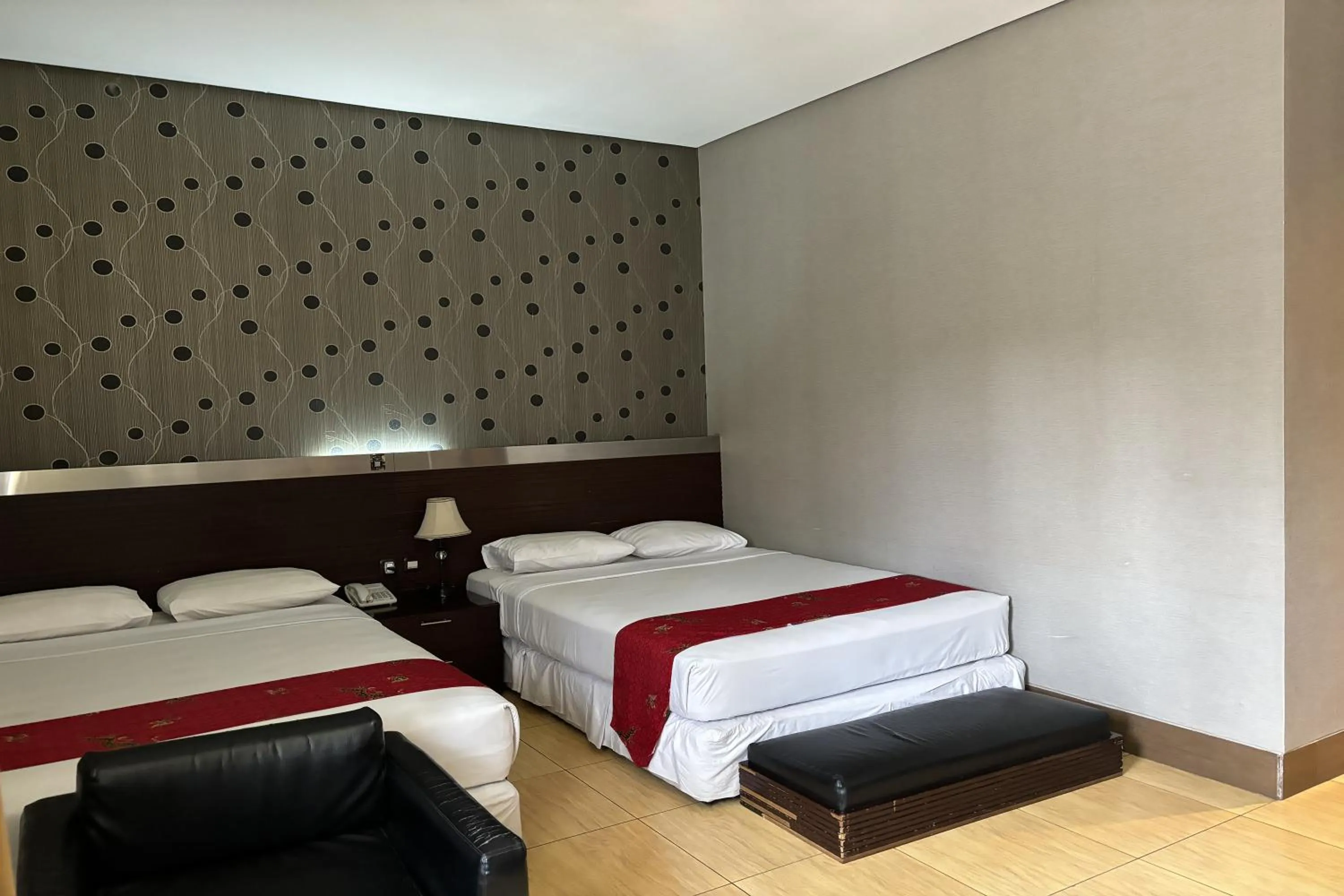 Bed in Hotel Pesona Bamboe Lembang