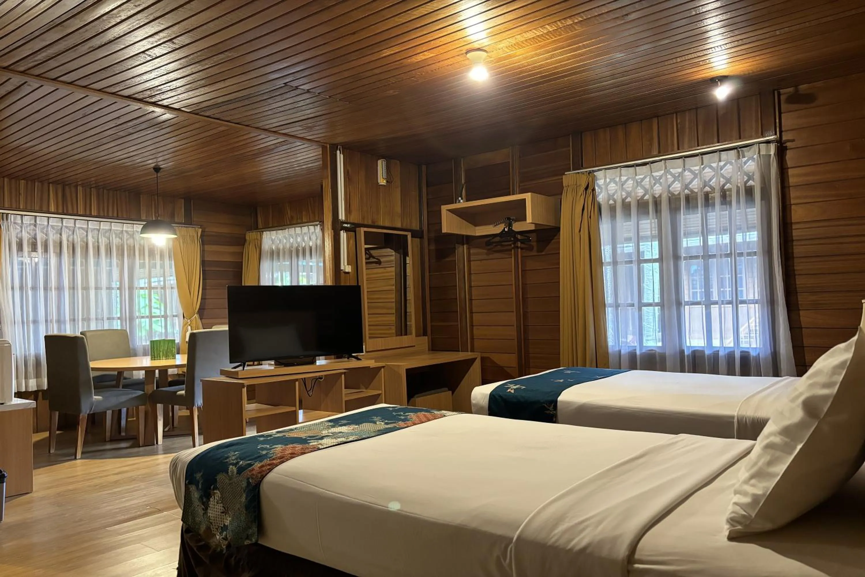 Bed in Hotel Pesona Bamboe Lembang