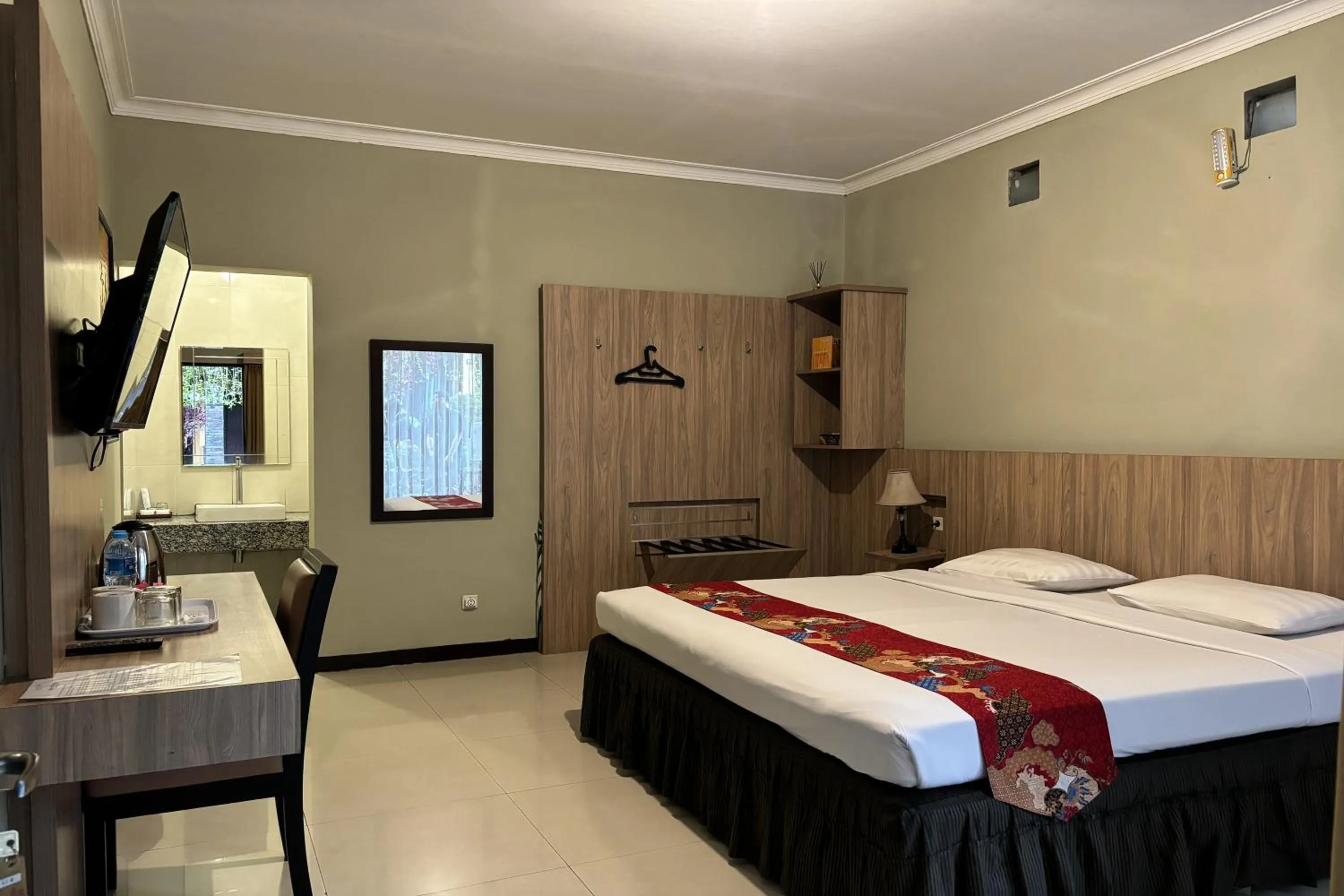Bed in Hotel Pesona Bamboe Lembang