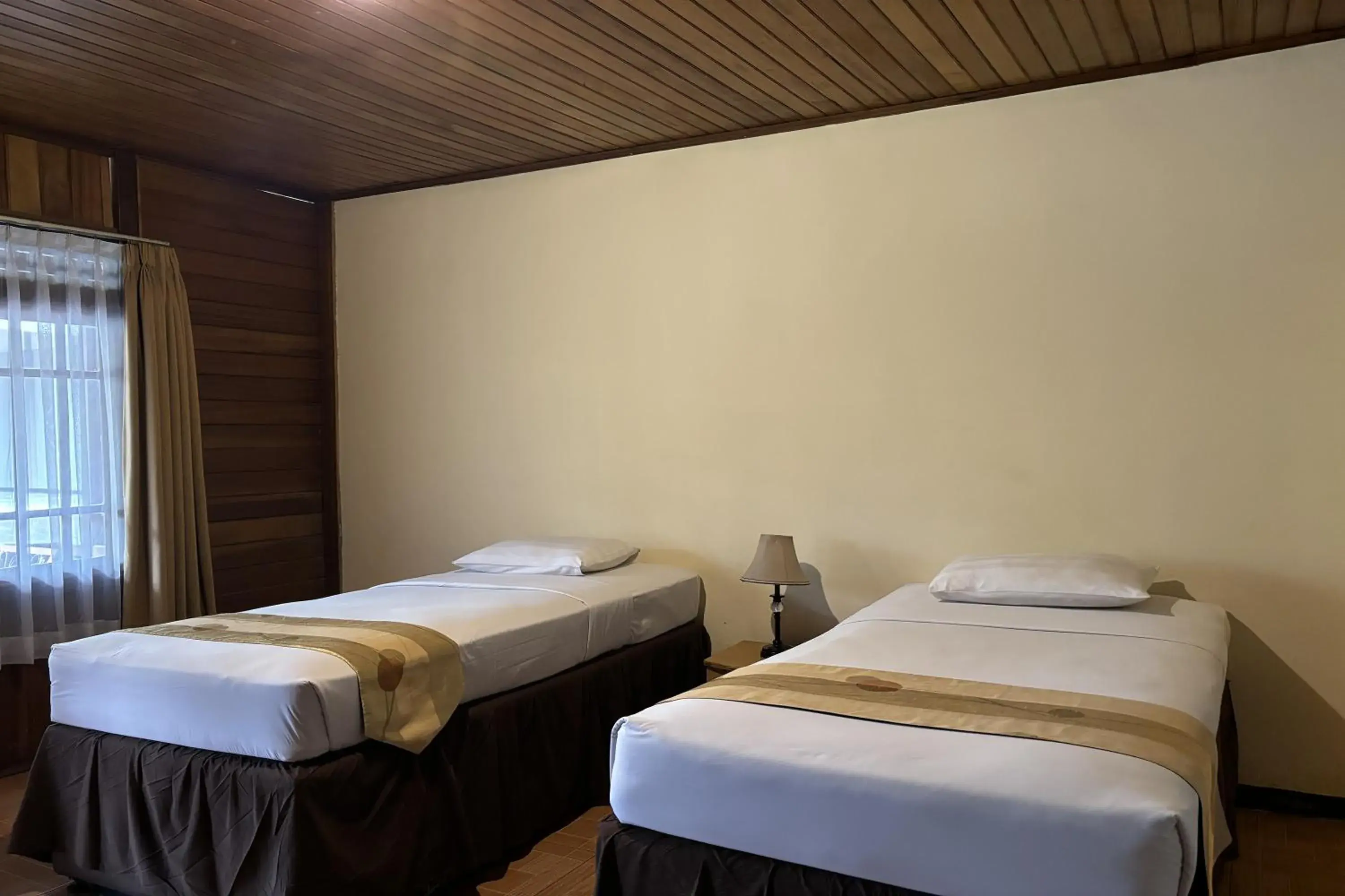 Bed in Hotel Pesona Bamboe Lembang Bed in Hotel Pesona Bamboe Lembang