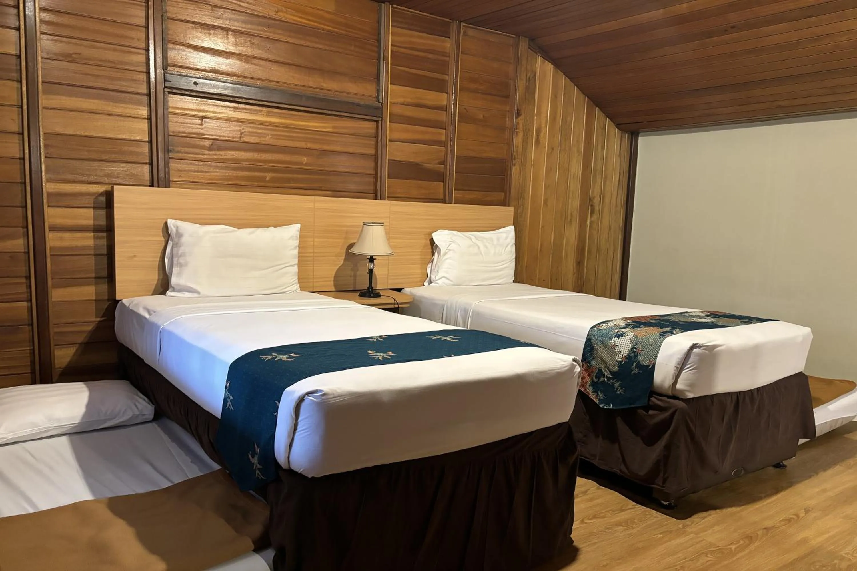 Bed in Hotel Pesona Bamboe Lembang