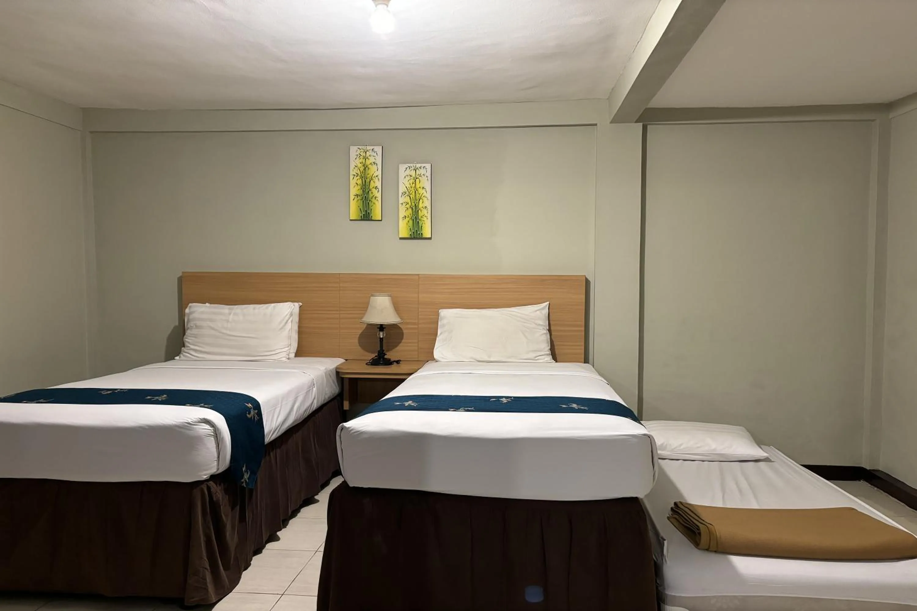 Bed in Hotel Pesona Bamboe Lembang