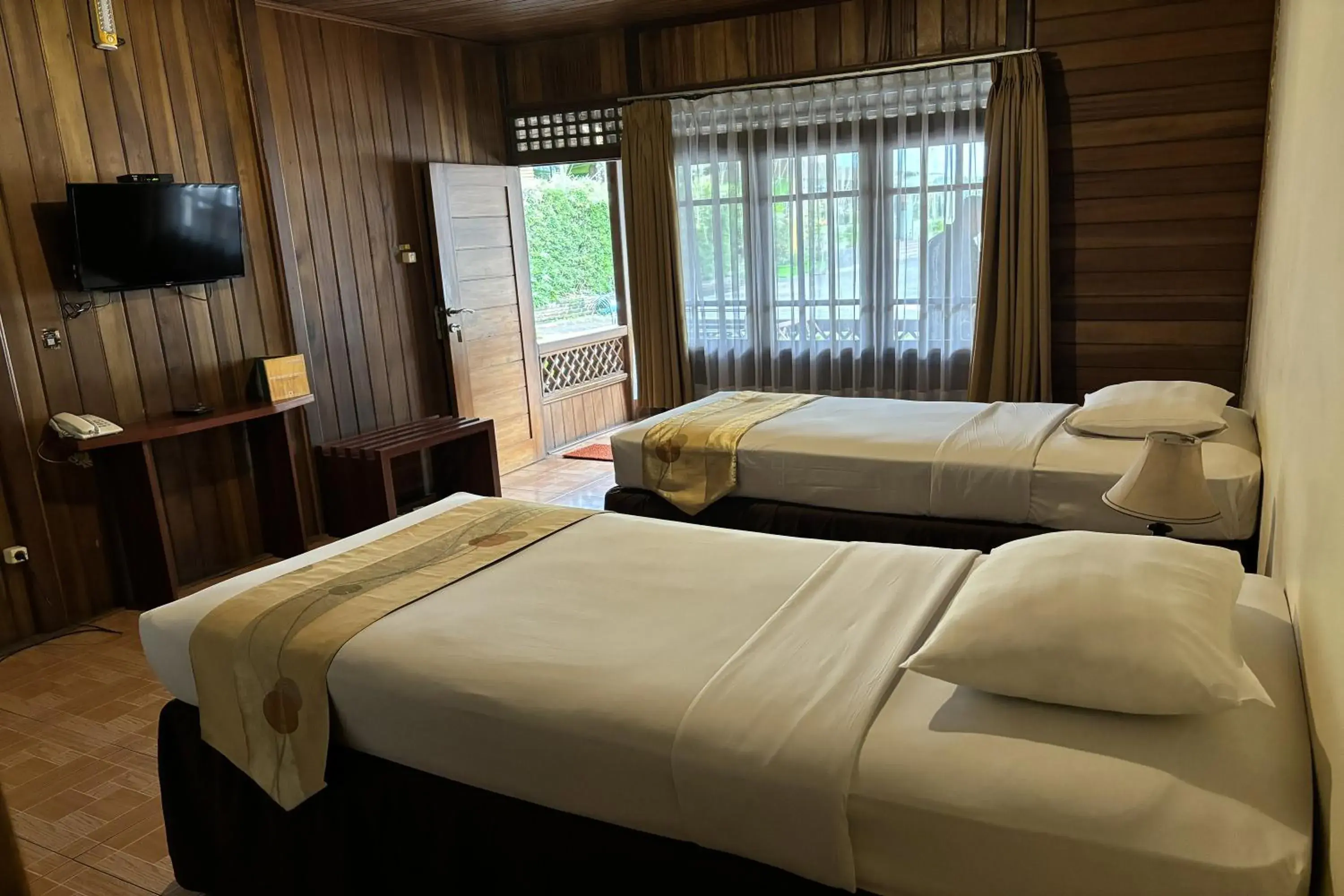 Bed in Hotel Pesona Bamboe Lembang Bed in Hotel Pesona Bamboe Lembang
