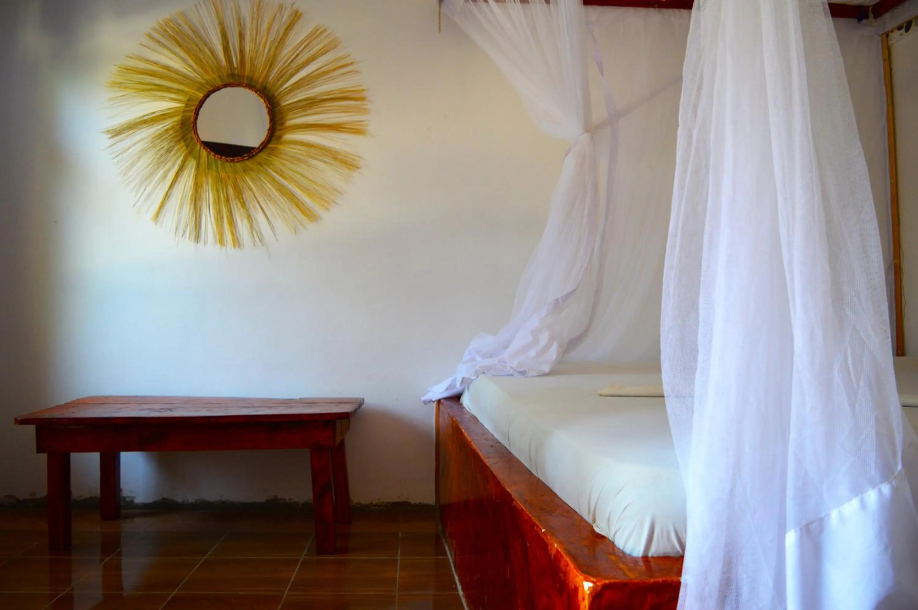 Bed in New Jambo Bungalows