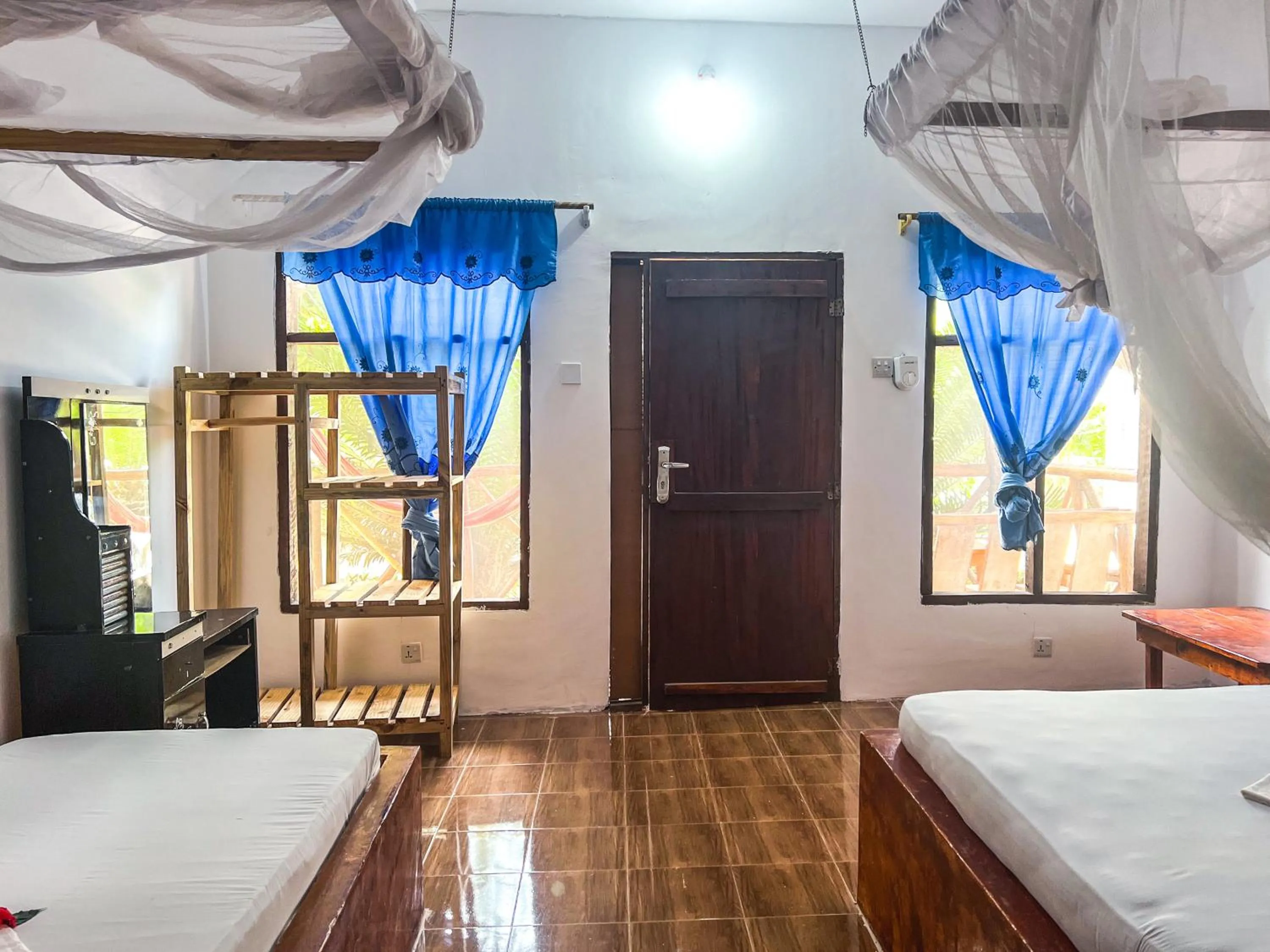 Photo of the whole room, Bed in New Jambo Bungalows