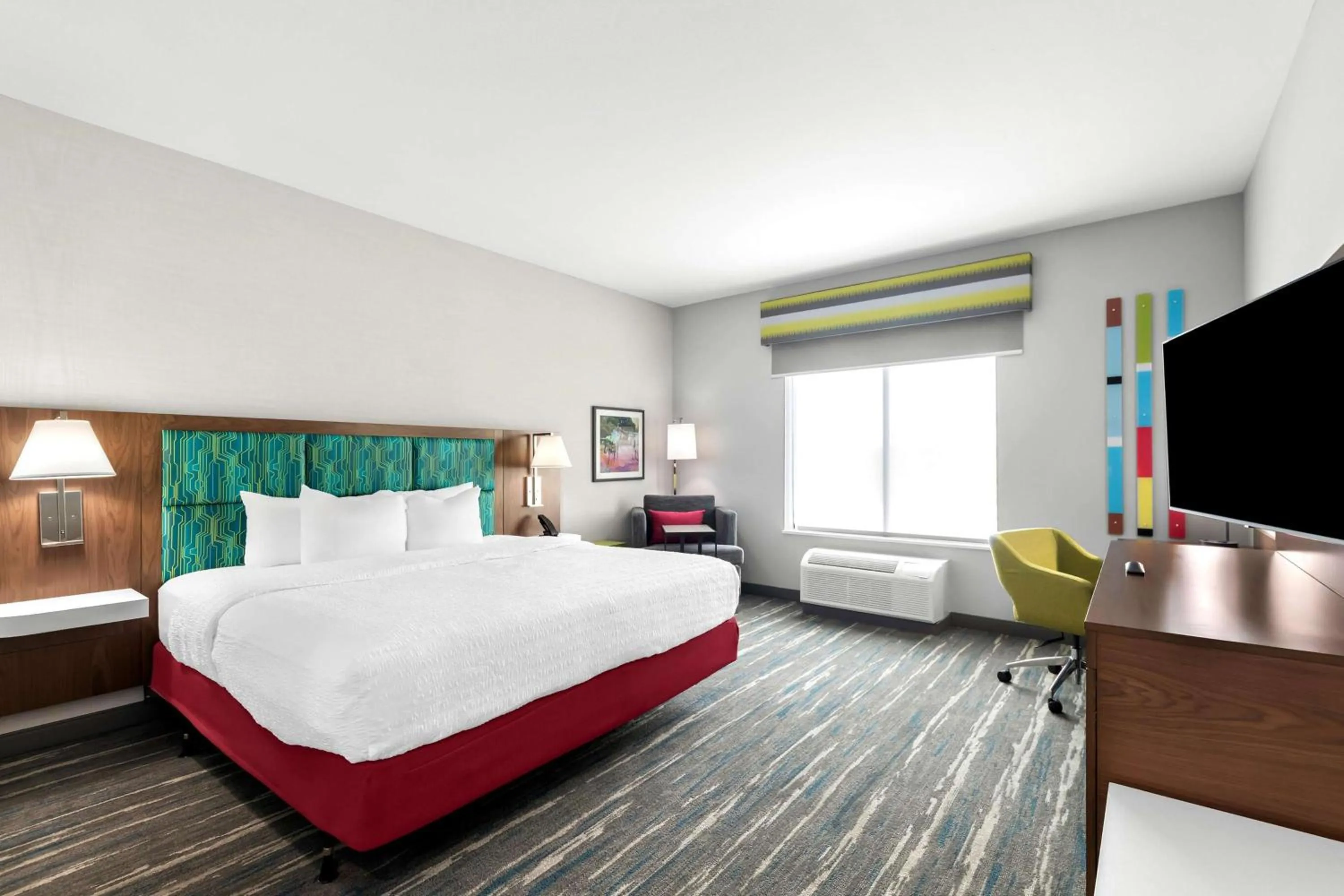 Bed in Hampton Inn & Suites Sherman